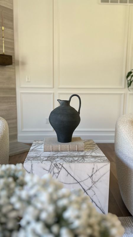 Simplicity and elegance 

Coffee table style. Modern organic. Transitional decor. Studio McGee. Magnolia. Home decor. Neutral decor. Marble side table. Boucle  

#LTKstyletip #LTKVideo #LTKhome