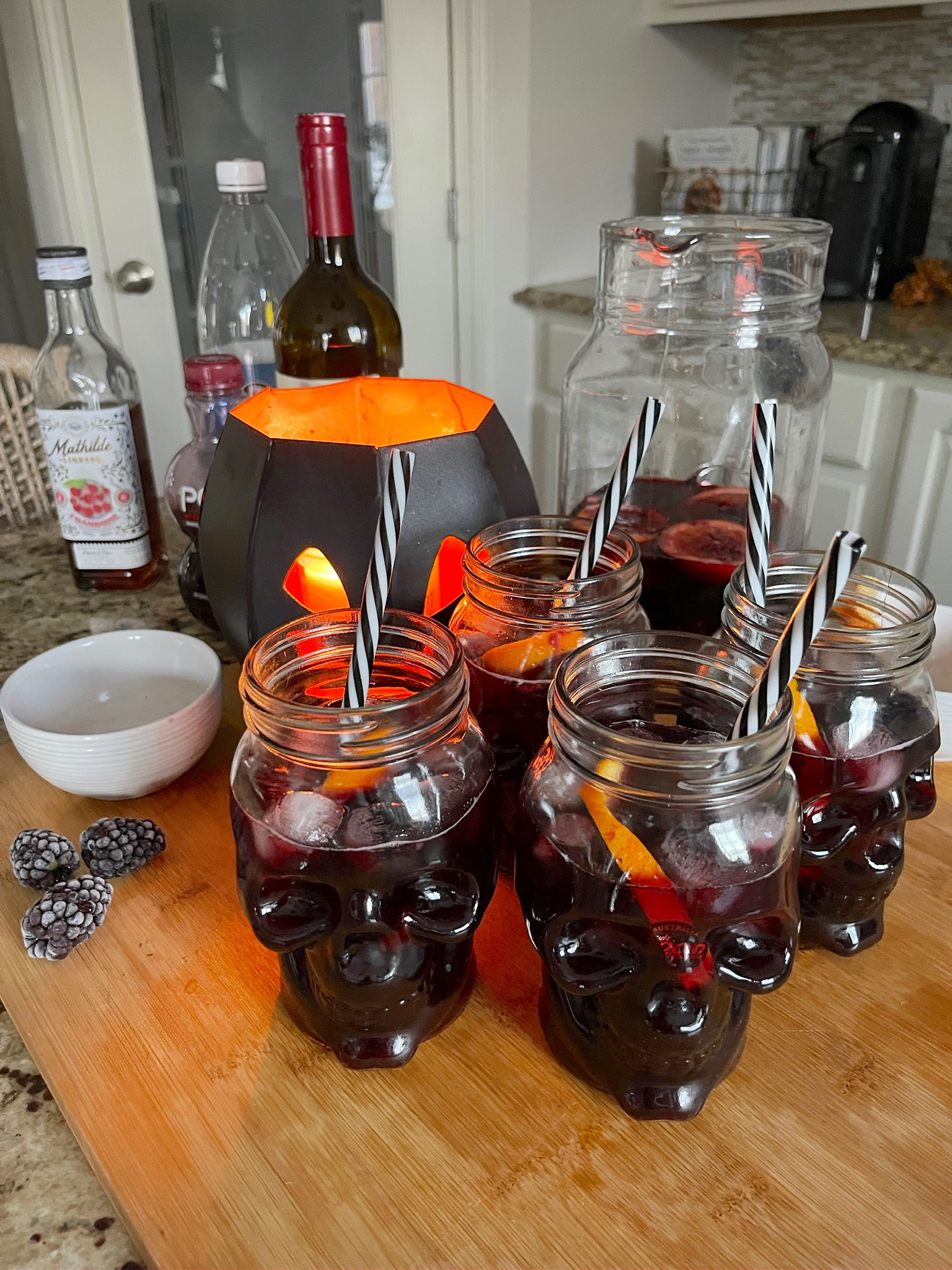 
SPOOKY SANGRIA

1 cup blackberries
2-3 blood oranges
1/2 cup raspberry liqueur
1 bottle red wine
1 cup pomegranate juice
2 cups club soda

Combine muddle blackberries, blood orange slices, and liqueur - stir. Add in bottle of wine, pomegranate juice, juice of one blood orange, and club soda. Stir & pour into your spooky glasses with a little fruit garnish!

Halloween party, skull glasses, spooky home decor, pumpkin decor, halloween home

#LTKparties #LTKHoliday #LTKHalloween