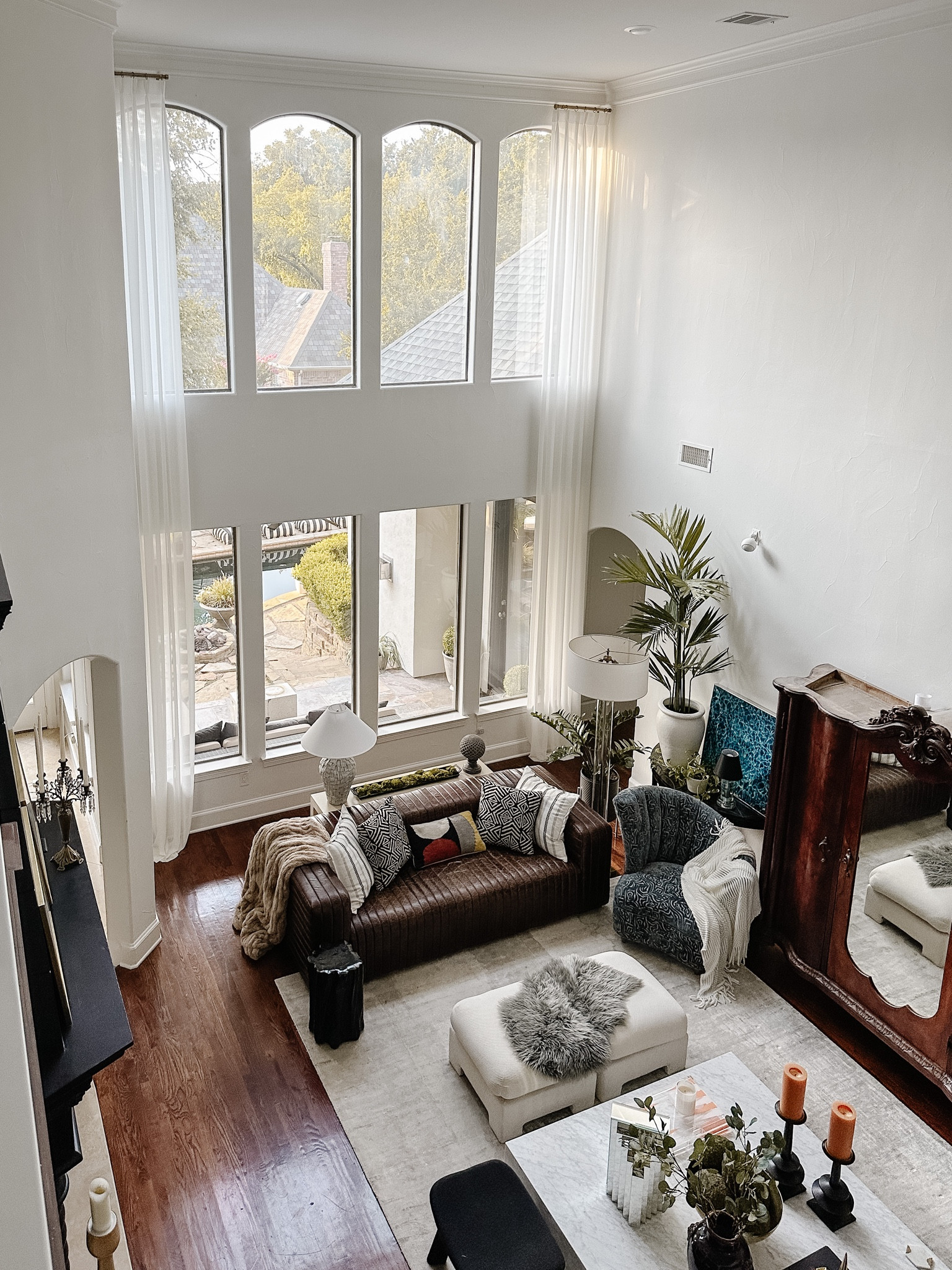 Our new 20 foot custom curtains from Curtarra have completely elevated our living room! In love! We ordered the Liz in white with triple pinch pleat header! 

#LTKhome