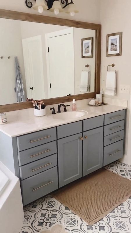 It’s all in the details! From new hardware to lighting and floor tiles, check out this dreamy master bathroom makeover!

Have you ever considered floor tiles in your bathroom? They’re pretty easy to DIY, let me know if you have any questions in the comments!

Bathroom remodel | floor tiles | bathroom hardware | bathroom vanity 

#LTKHome #LTKSaleAlert