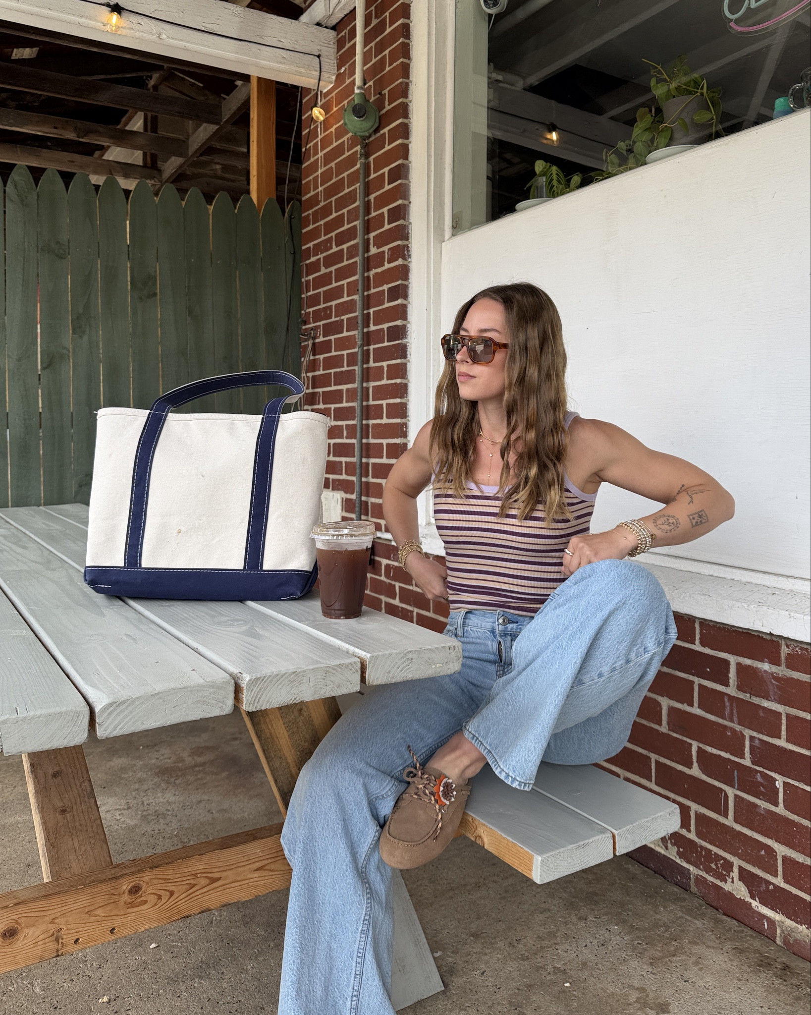 4/12/26 Casual Spring Outfit

An easy, everyday spring outfit I keep reaching for 🤍

Wearing my Aerie striped tank with my favorite Abercrombie loose jeans — the kind of outfit that feels effortless but still put together. Paired with my go-to boat shoe slides and my LL Bean tote for a classic, casual look.

Sunglasses are Vehla (can’t link), but everything else is linked here ✨

#LTKootd #LTKSeasonal