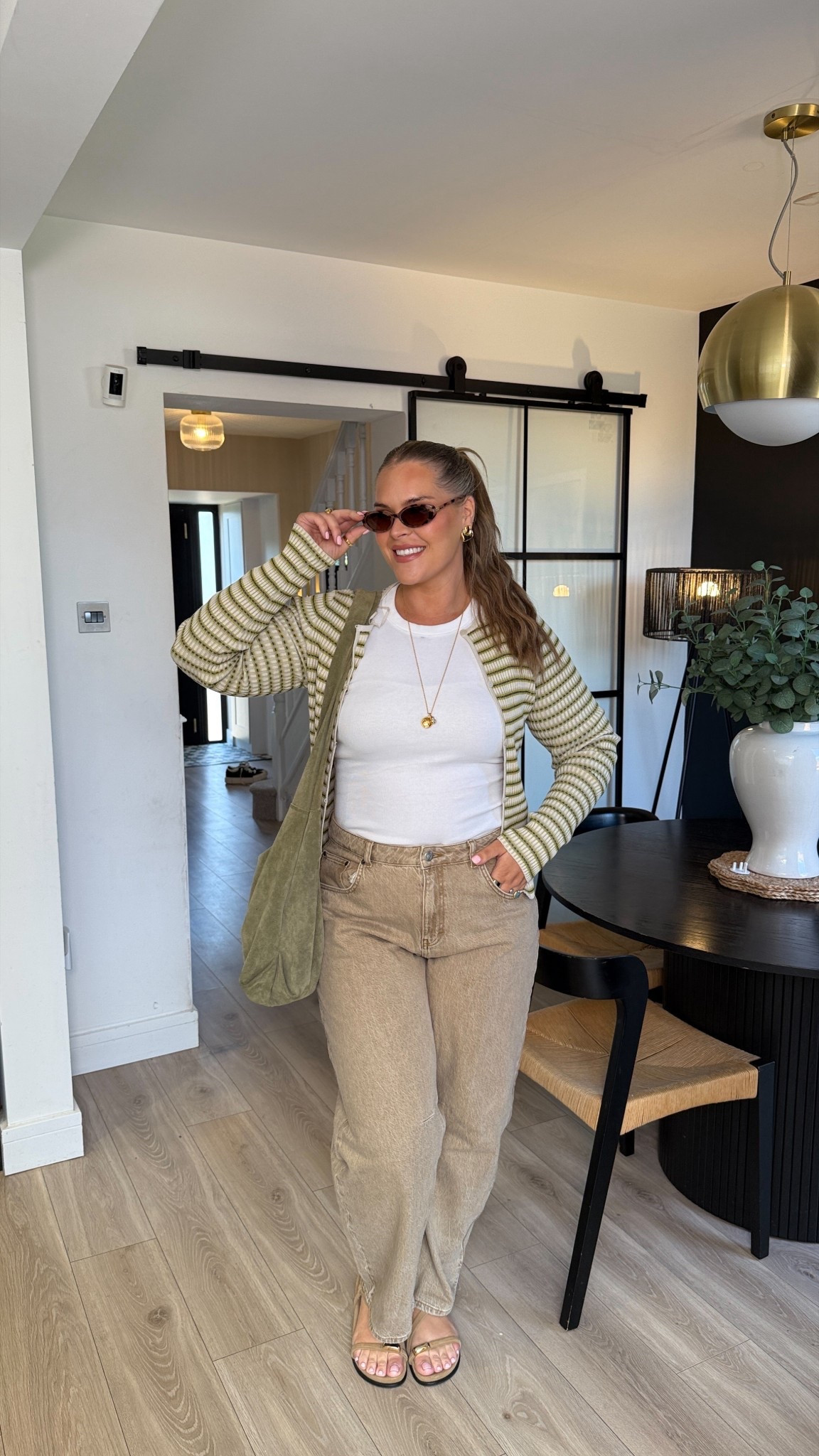 Summers day outfit! I’m having a green moment for sure! I wear a large in the white top, w34 L32 in the jeans and a 16 in the cardy! Bag is Steve Madden but from a few years ago sorry!! 

#LTKspring #LTKsummer #LTKstyletip