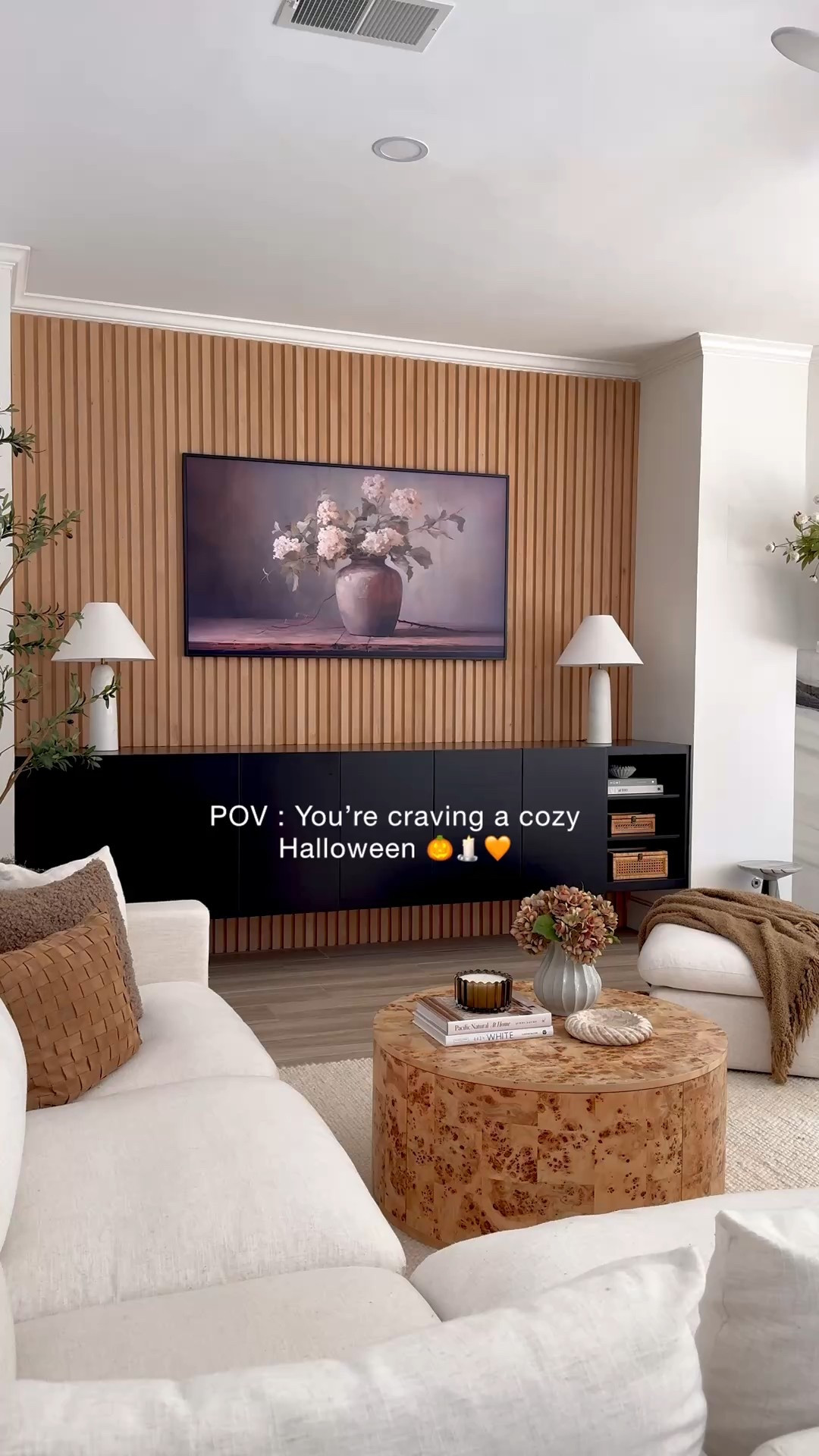 Decorating my living room built in cabinet with my Pottery Barn terracotta pumpkins - just added some Spanish moss for a spooky look & remote control flickering candles. 

#LTKFamily #LTKHome #LTKFindsUnder50