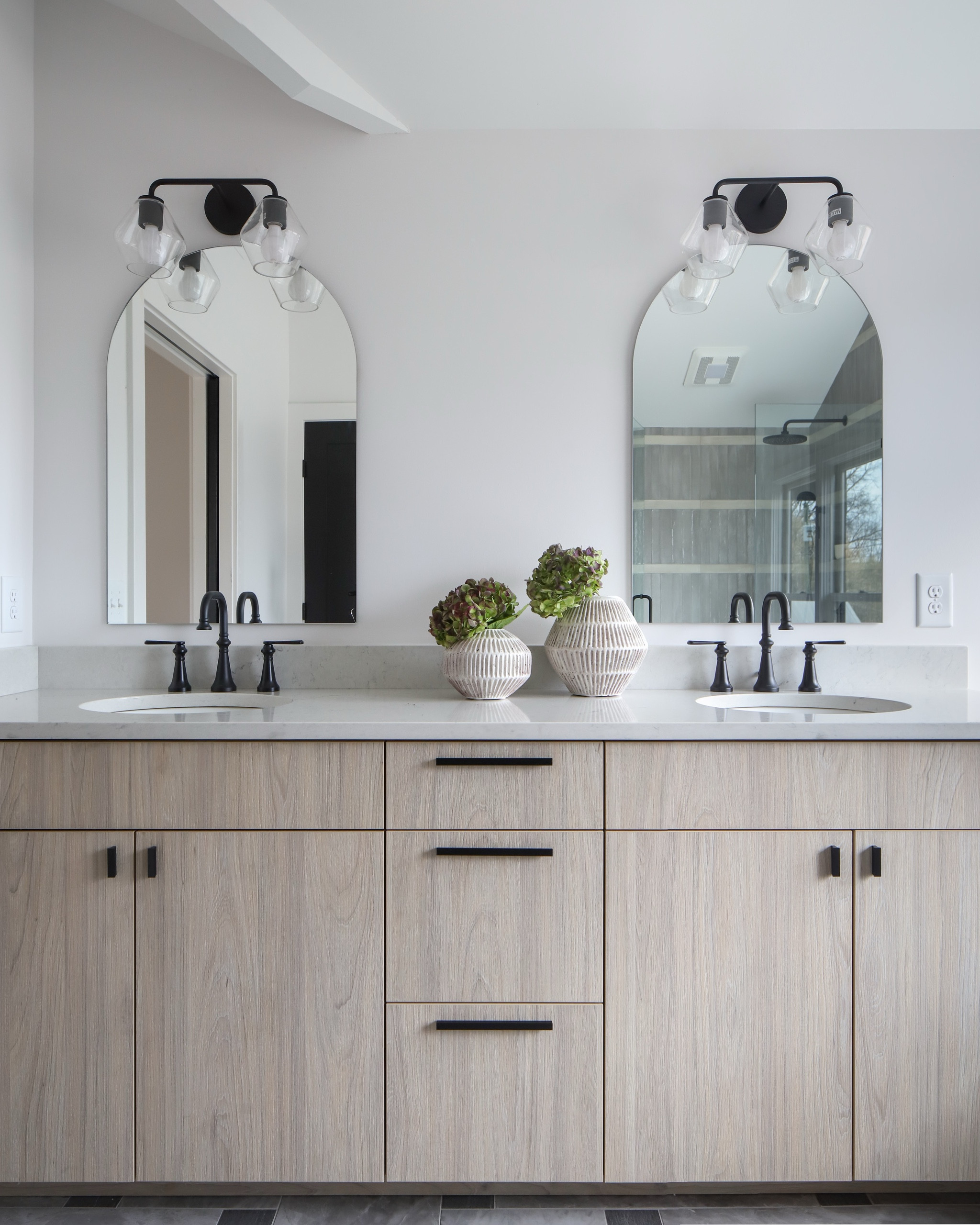 I got some questions about these mirrors and light fixtures from my last Instagram post, so I wanted to link them here! These fearless double mirrors are perfect over this white oak double vanity.

Target vases, mirrors, black light fixtures, sconces, black hardware, white quartz countertops, rejuvenation, plumbing, Home Depot, lowes

#LTKfindsunder50 #LTKsalealert #LTKhome