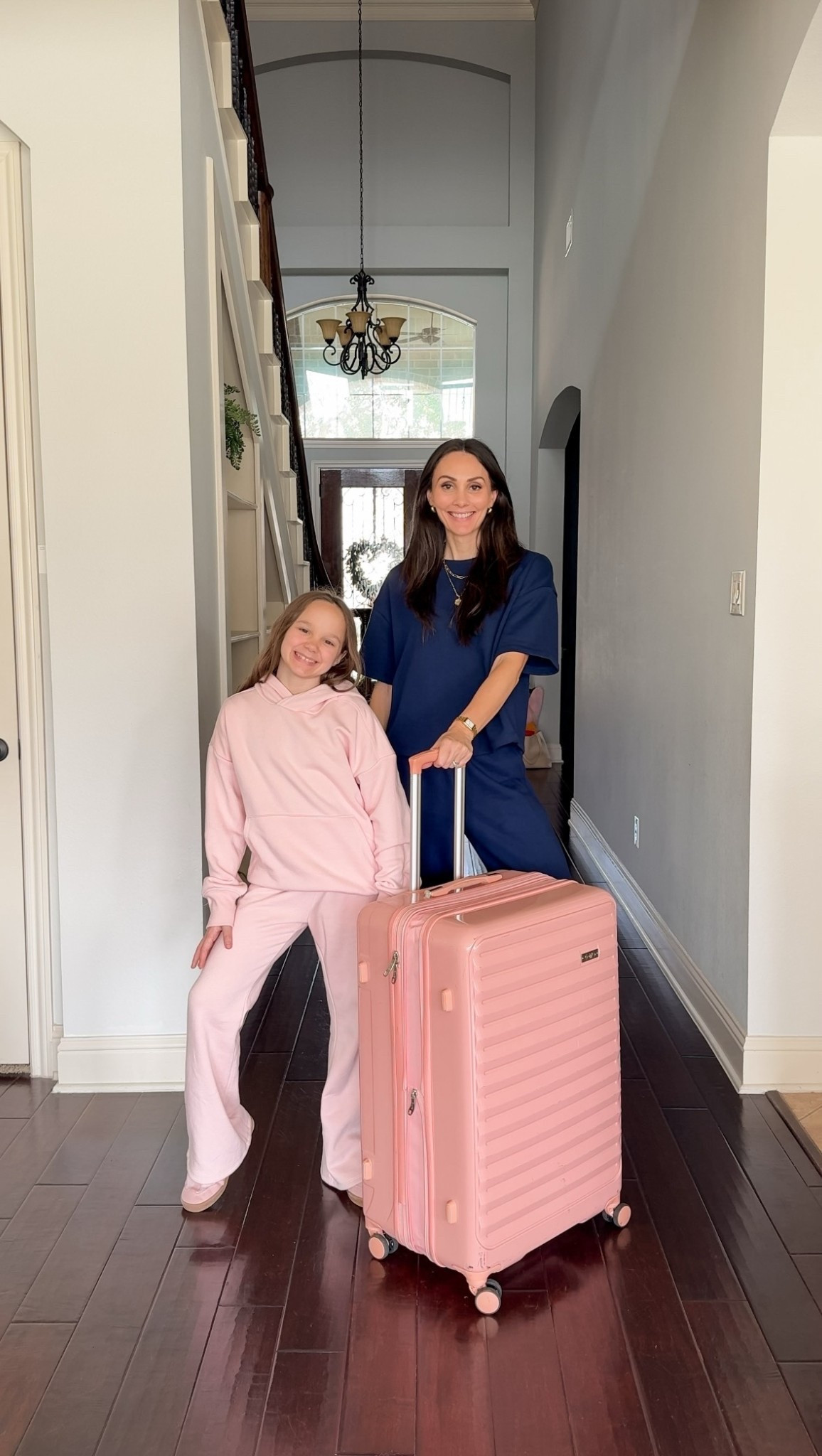 Travel outfits ✨  I’m 5’9”, pants could be a little longer but work. Wearing a medium in both. Looks $$$ but it’s not!

Navy terry set womens, pink fleece set girls, pink hard luggage

#LTKKids #LTKTravel #LTKmomlife