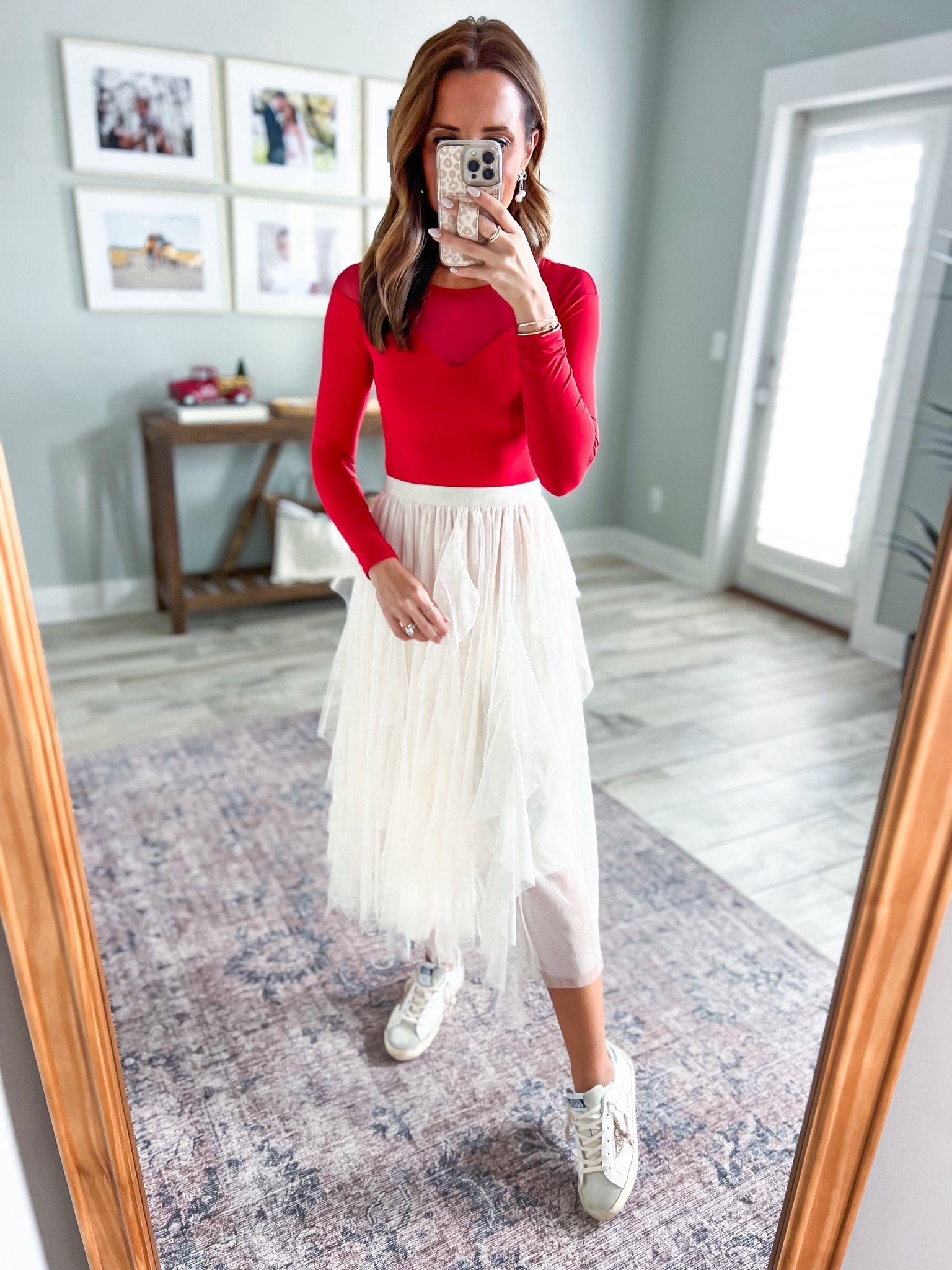 New Years Eve outfit (add heels instead). NYE outfit. Amazon tulle skirt in scalloped apricot. Amazon seamless bodysuit in XS. Date night outfit. Party outfit. Golden goose glitter sneakers. 

#LTKparties #LTKshoecrush #LTKHoliday