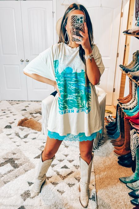 Willie Nelson urban outfitters oversized graphic tea bought a large extra large comes in three colors put a lace satin slip dress under it with my Kayci boots perfect for a country concert music festival or trip to Nashville
 

#LTKfindsunder50 #LTKfindsunder100 #LTKFestival