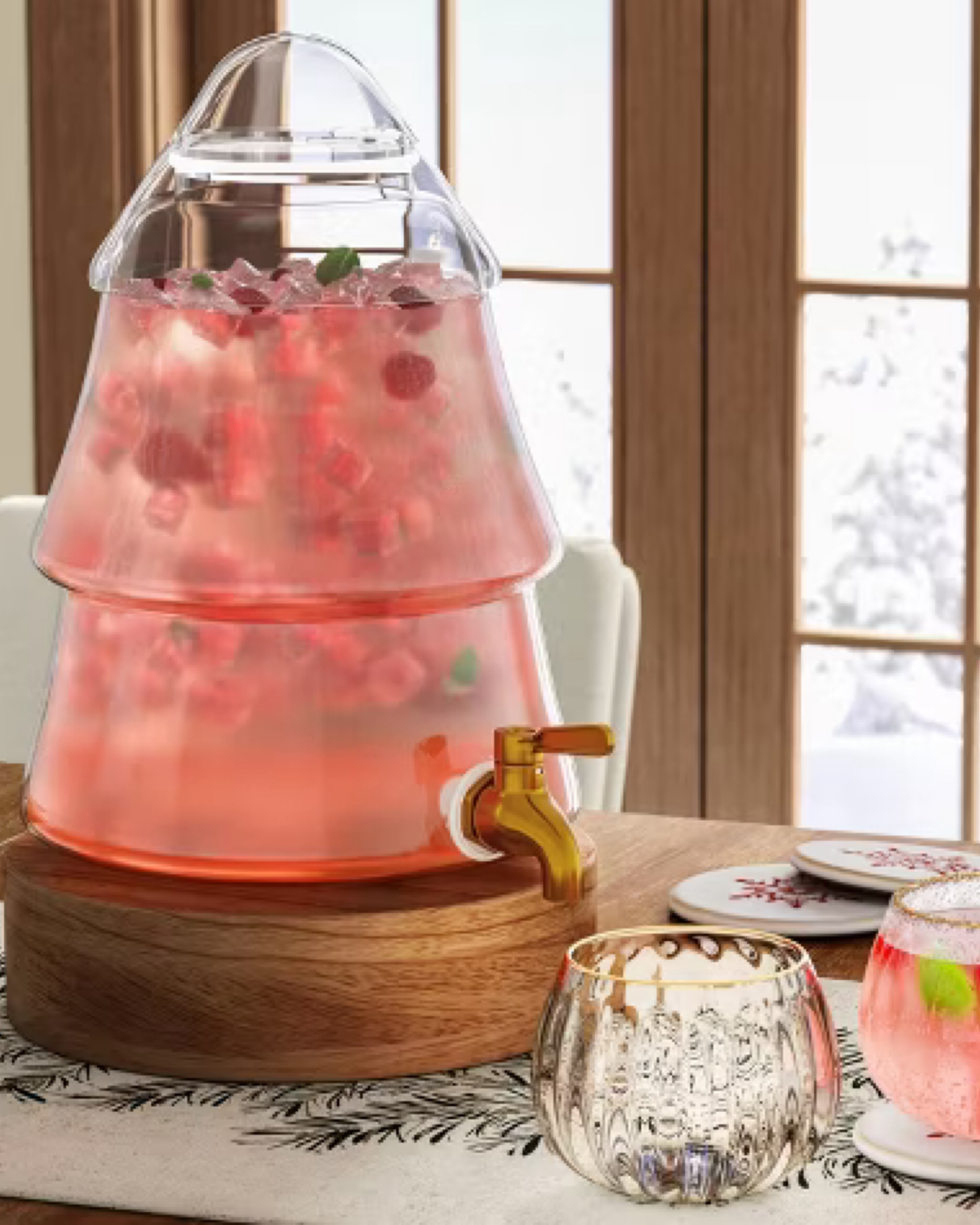 Add a festive flair to your gatherings with the 1.5 Gallon Christmas Tree Beverage Dispenser. Perfect for holiday parties and special occasions, this unique dispenser is shaped like a Christmas tree, bringing seasonal charm to your drink station. The clear, BPA-free design showcases colorful beverages beautifully, while its generous capacity keeps the refreshments flowing. Made for cold drinks and dishwasher safe, it combines style and convenience, making it an essential for effortless, festive hosting.

#LTKHome #LTKHoliday #LTKParties