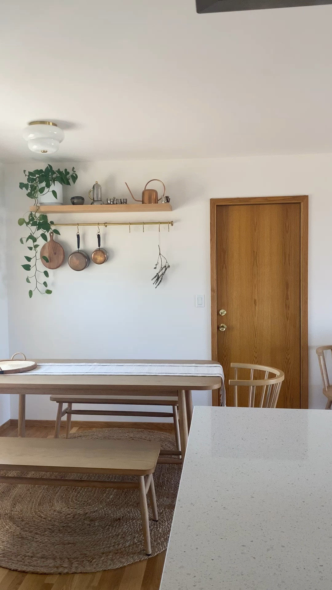 From the moment we saw our Dining Nook, we knew that we wanted to center the dining table under the window and add a shelf with a brass rail. We wanted to extend our kitchen storage and create a focal point display space for special items like my grandmother’s copper pots. 

#diningnook #diningroomdesign #eatinkitchen #midcenturyranch #kitchenrenovation #neutralinteriors

#LTKhome