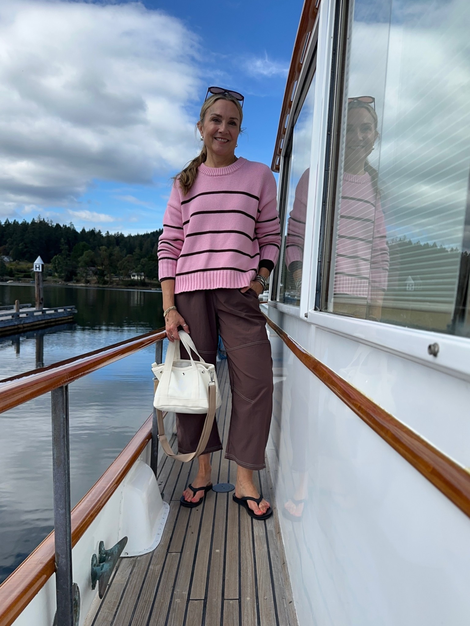 Outfit of the day: @Quince pink & brown striped sweater, @Aerie nylon barrel pants, and Quilted Koala canvas tote bag. 

I’m 5’6” and wear small in tops and pants. 

Over 50 outfit for women, fall outfit, travel outfit

#LTKOver40 #LTKTravel #LTKootd
