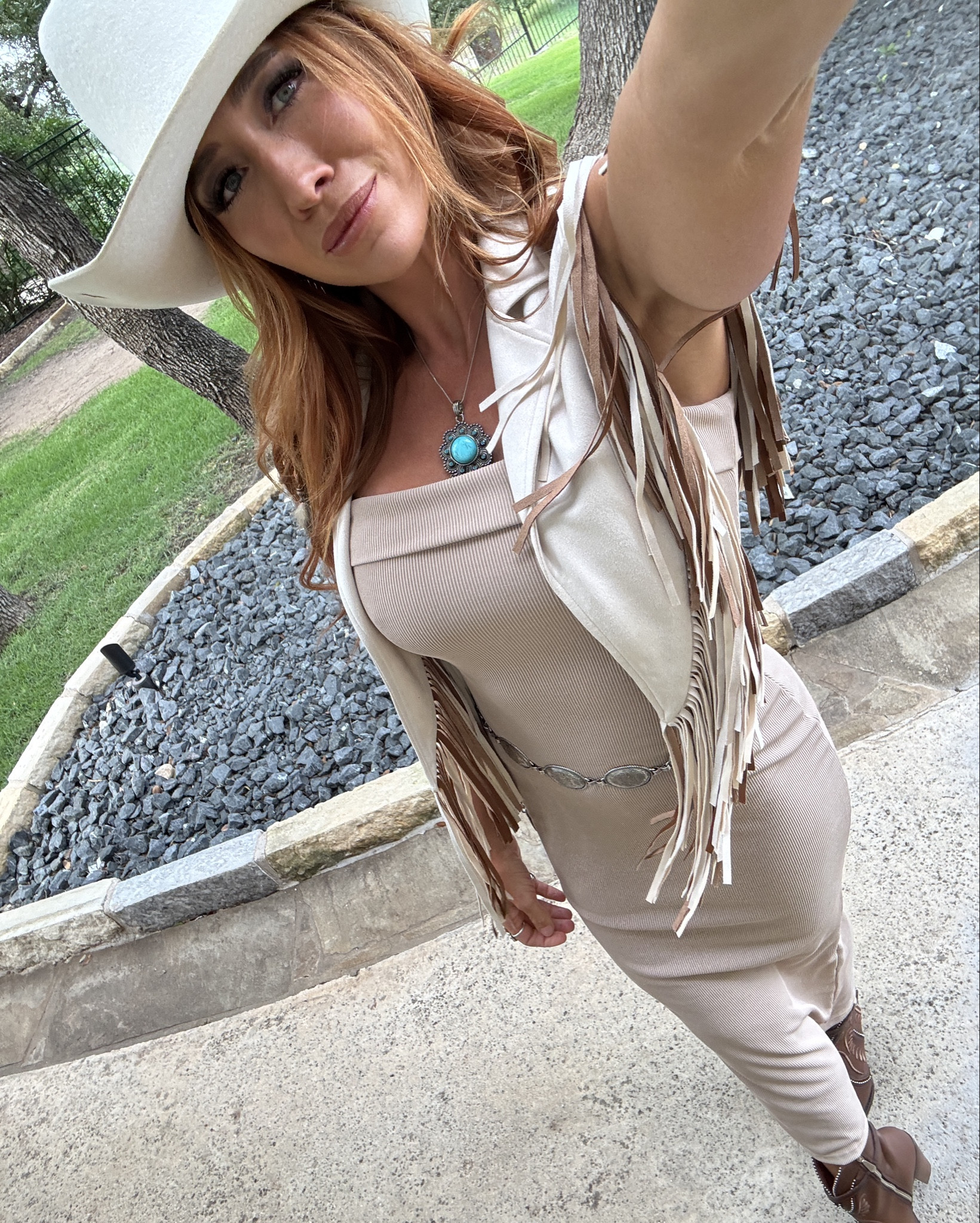 Elevated western wear! 
Bolero is from cowhide and Conchos 
