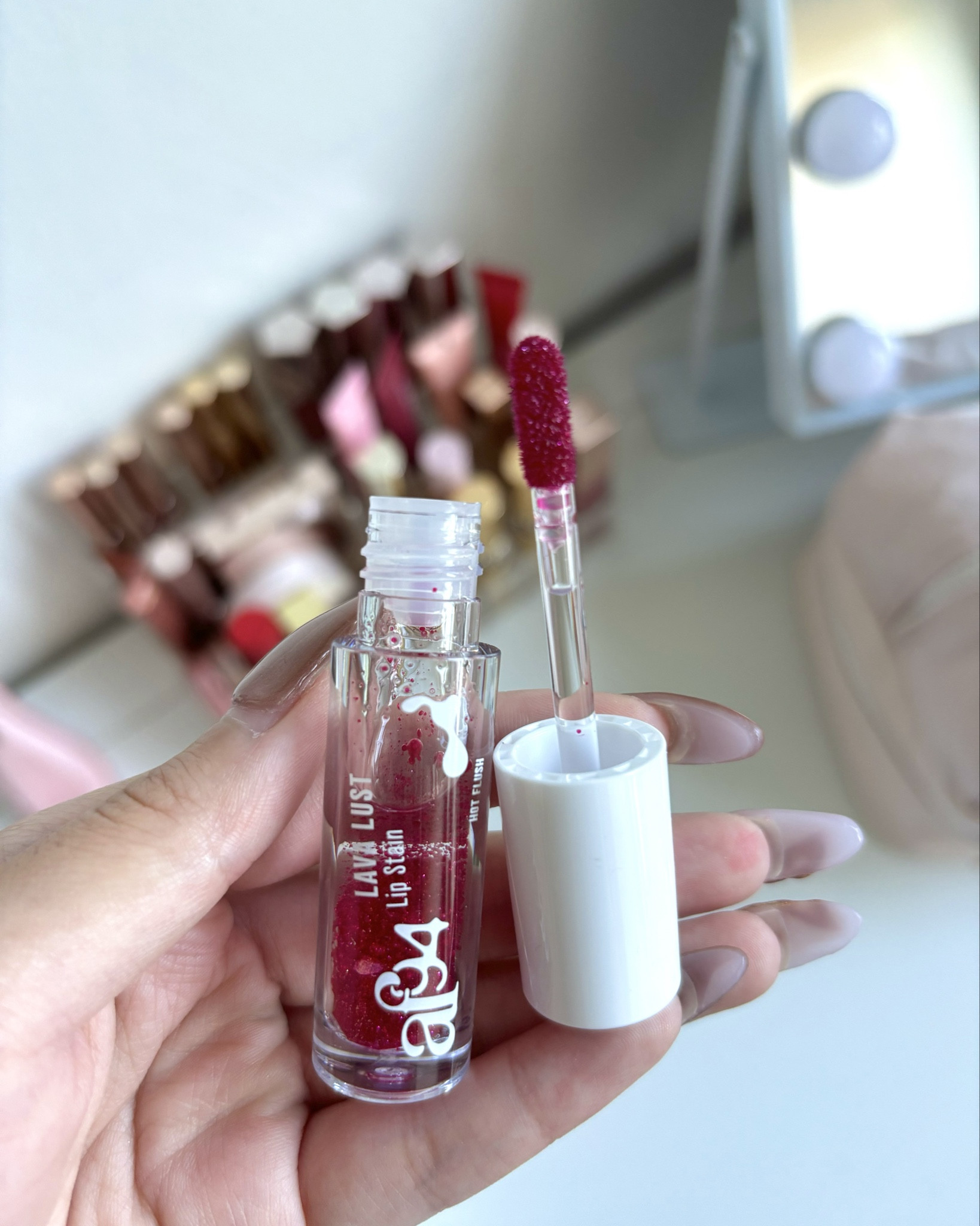 Lip stain 

Glitter lip stain . Juicy lip stain . Affordable makeup . Summer makeup inspo . AF94 . Lava Lust 

#LTKSeasonal #LTKBeauty