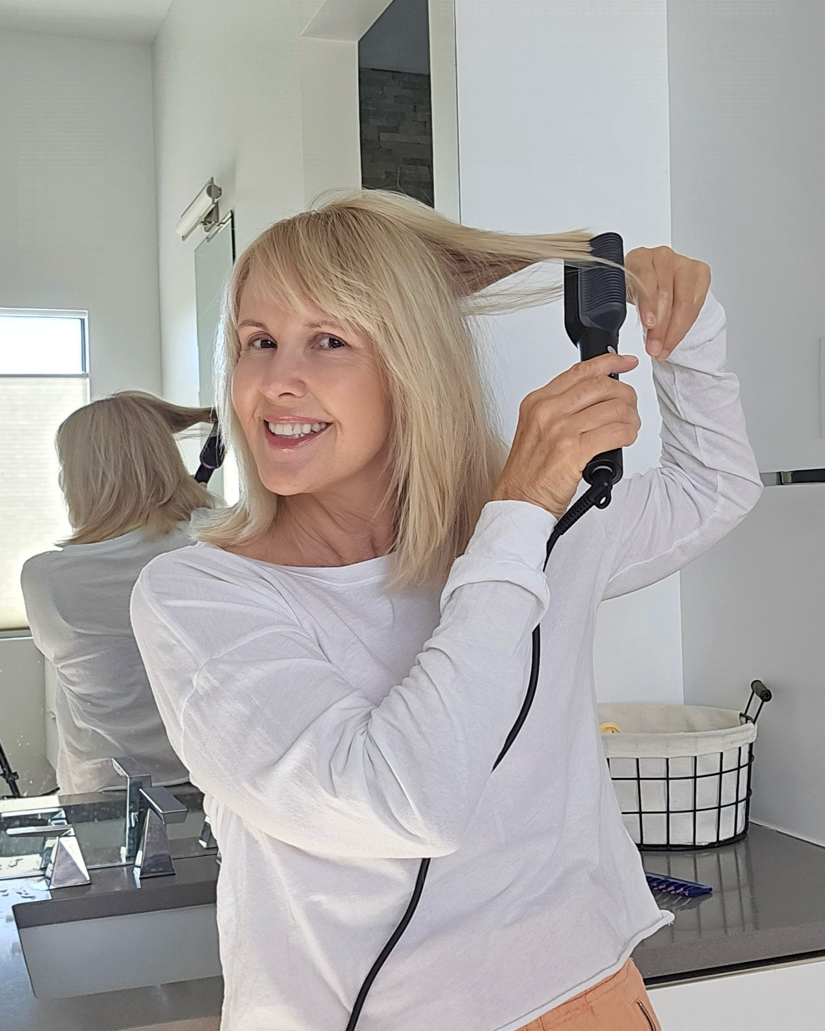 This inexpensive ceramic hair straightening brush works beautifully, and is so easy to use! There are five heat settings and it heats up quickly. It comes with a handy travel bag, and it’s great for a quick touch up, too. Use on dry hair. 

#LTKBeauty #LTKOver40