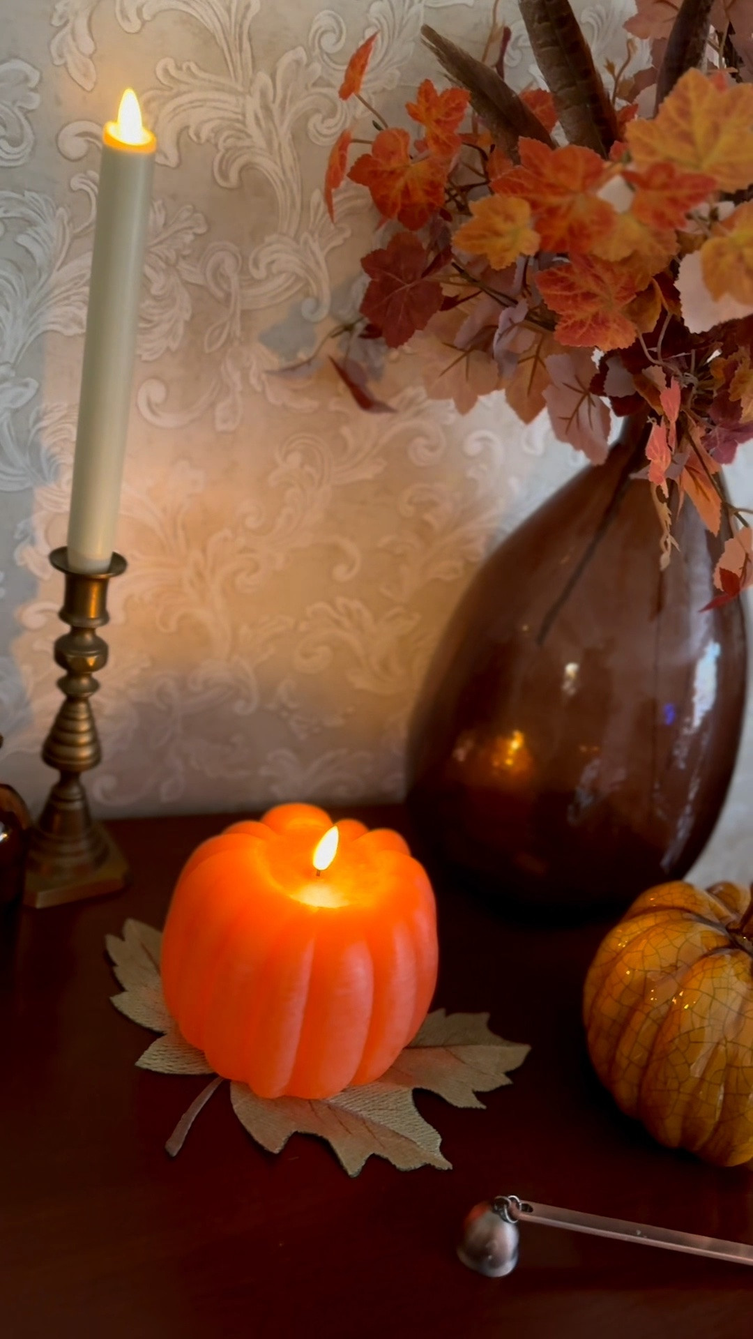This pumpkin candle adds the perfect cozy touch to your fall and Halloween home decor