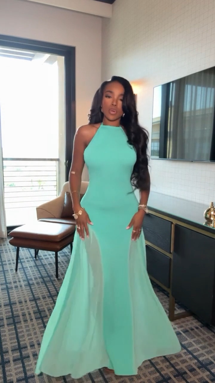 A timeless silhouette in the most breathtaking mint tone — this gown moves with you and makes the softest, most elegant statement. Clean lines, a halter neckline, and a flowing skirt that photographs beautifully from every angle.

Perfect for weddings, formal events, galas, and special celebrations.

📏 Sizing: Dress size Small  
📐 Measurements: 5'4", 138 lbs, 34D bust, 27" waist, 40" hips  

Shop instantly on the app — every detail is linked for you.

Featuring halter gowns, mint evening dresses, special-occasion outfits, elegant formalwear, and timeless event styling.

Follow me on Instagram and YouTube @kirasfashionfinds  