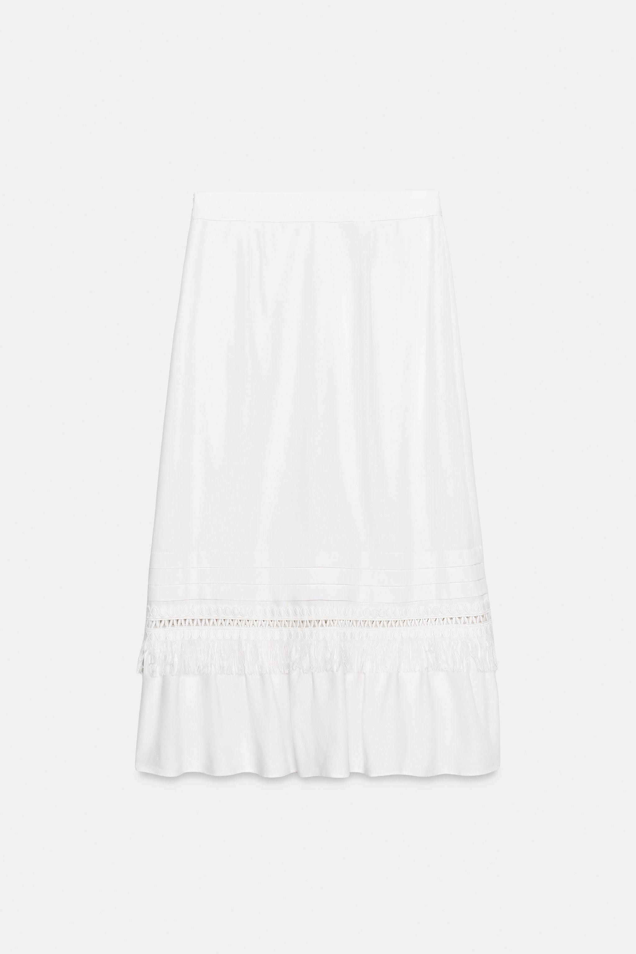 Midi skirt made of linen. Hem with pleats, fringe, and ruffle details. Lined. Side hidden in-seam... | Zara US