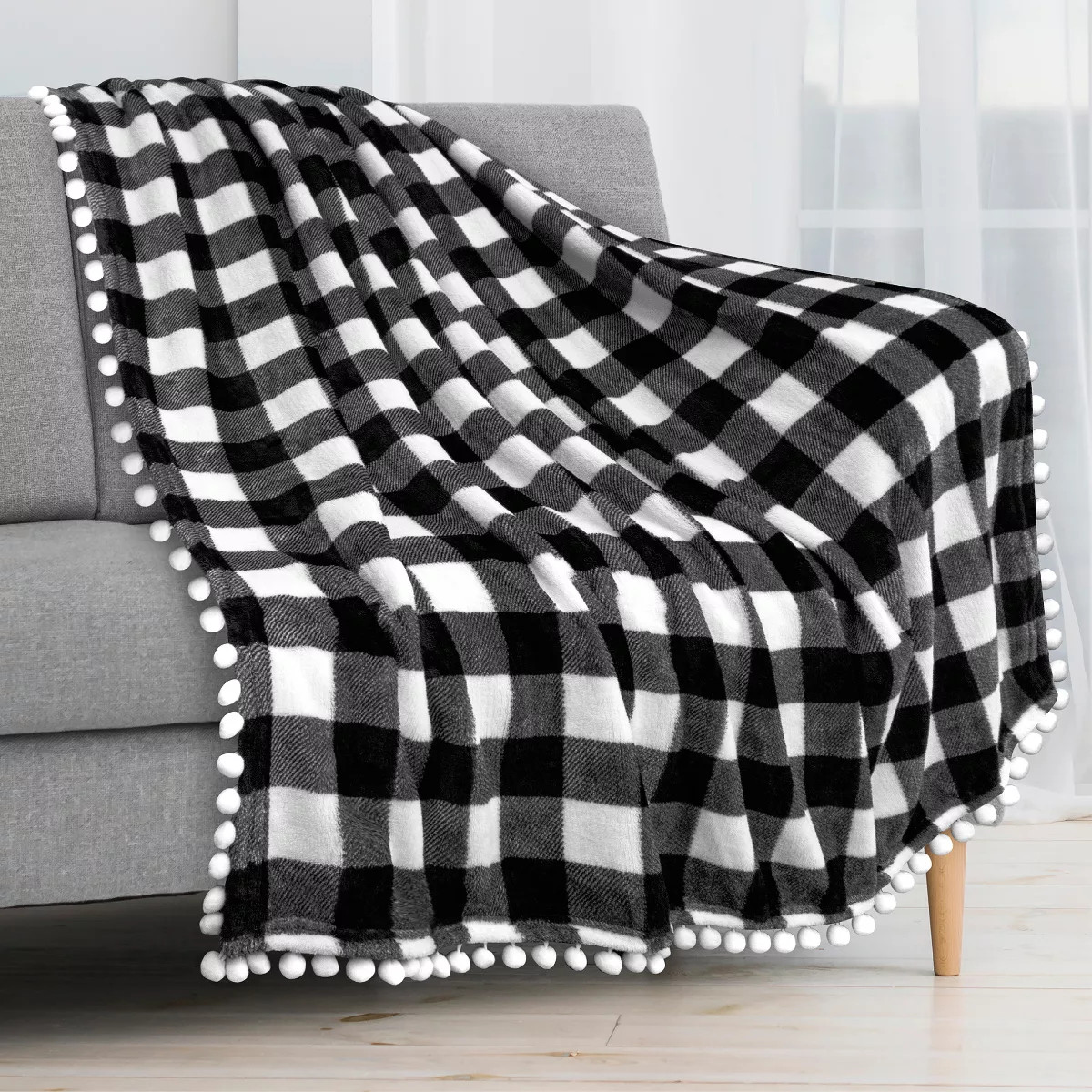 PAVILIA Fleece Pom Pom Blanket Throw for Sofa Bed, Soft Lightweight Pompom Fringe Blanket for Cou... | Target
