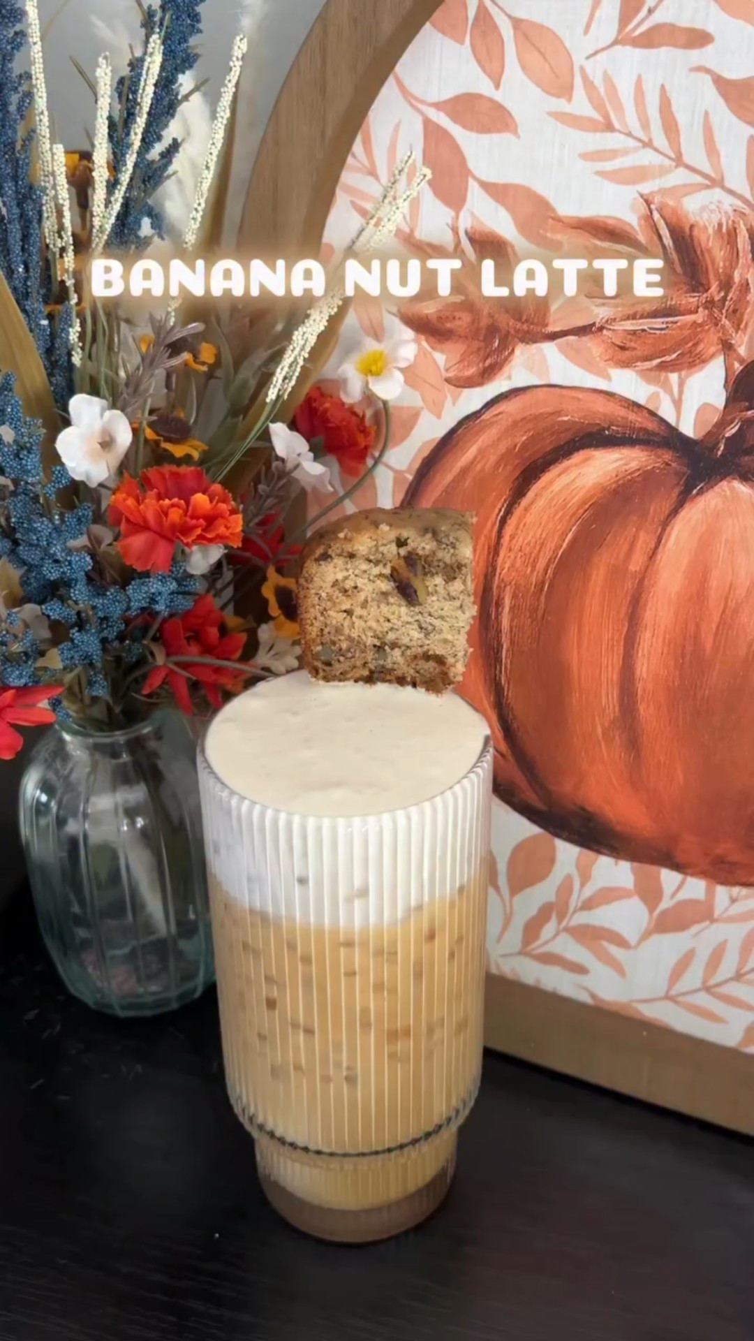 I’m pretty bananas for this banana nut latte 🍌

Syrup -
•toast 1/2 cup coarsely chopped walnuts
•add 3 overripe bananas, mashed
•1 cup water
•1 cup brown sugar
•2 tbsp cinnamon 
•boil & reduce to a simmer 10-15, then strain

Latte -
•bianco doppio @nespresso 
•homemade banana nut syrup
•sweet cream creamer @chobani 
•ice 

Cold Foam -
•2 tbsp milk
•3 tbsp heavy cream
•1 tbsp brown sugar cinnamon sauce @kyyachocolate (10% off with code “MEGANKYYA10, link in bio) 
•forth until fluffy

•pour cold foam on top of latte
•top with a slice of banana nut bread 💛

✨I’m Meg, the Iced Coffee Connoisseur! I’m bringing you all things coffee — including fun at home recipes & honest reviews of coffee shops all across NJ✨

#athomecoffee #coffeerecipes #nespressorecipes #banananutlatte #banananutlatterecipe #bananalatte #bananalatterecipe #athomecoffeerecipes #nespressovertuo