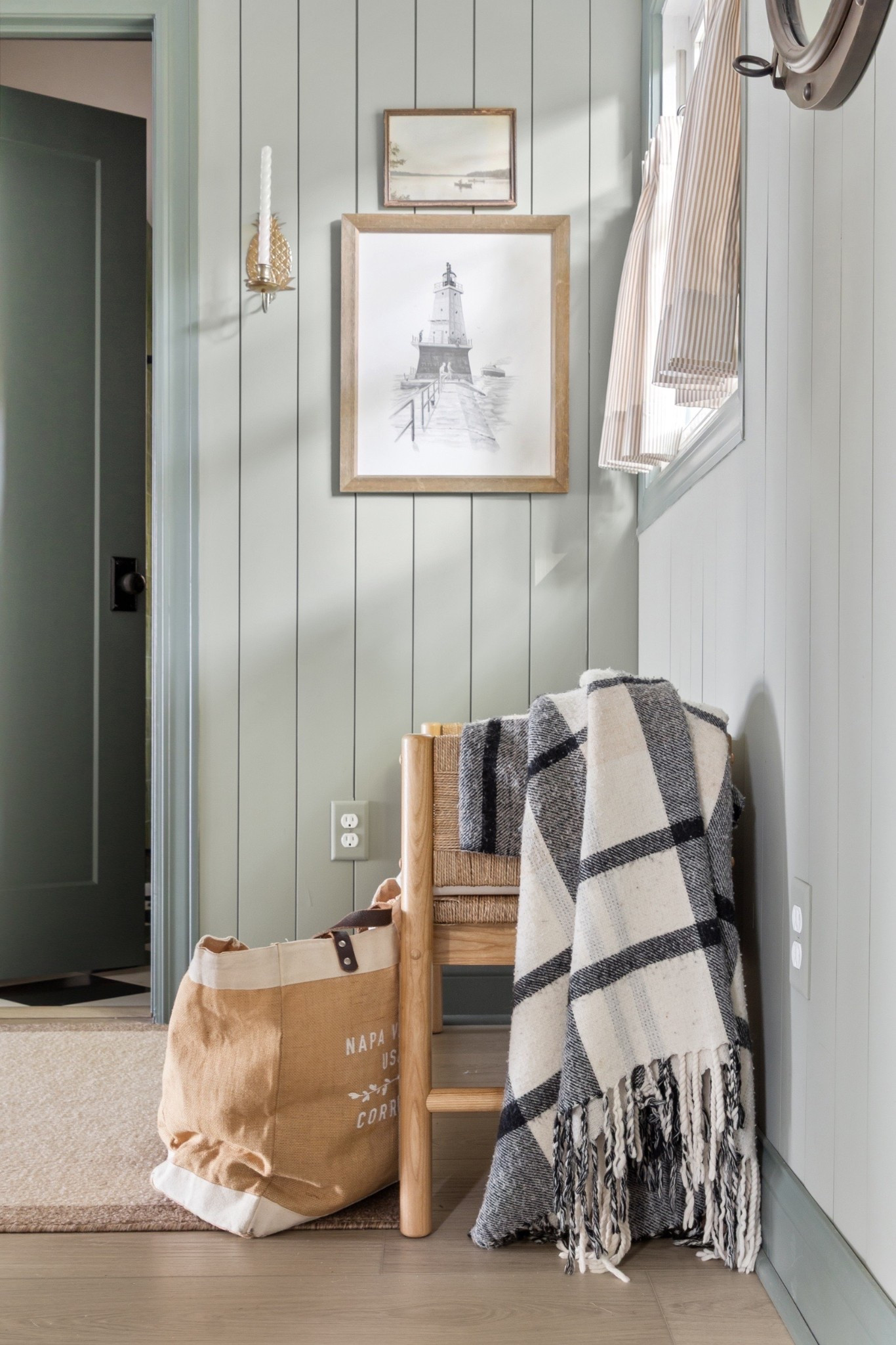 This Cozy cottage mudroom proves that functional can still feel beautiful. Vertical paneling, warm wood, and layered textures create a space that works hard while welcoming you in. It it organized, approachable and thoughtfully styled for real life. 

#cozycottage
#mudroomstyle
#layeredliving
#transitionalDesign



#LTKHome #LTKKids #LTKSeasonal