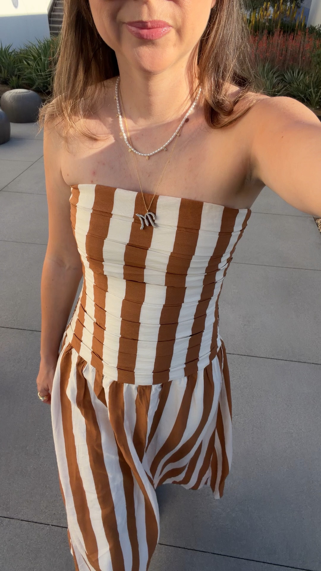 This striped strapless dress is one of those pieces that just works. The vertical stripes make it feel extra flattering for petites (I’m 5’2) and the drop waist gives it that effortless, elevated look without trying too hard.

I love pieces like this because they’re easy to repeat all season — vacation, summer dinners, sandals during the day, or dressed up with a heel. It’s lightweight, comfortable, and one of those dresses you’ll reach for again and again.

Dress small


#LTKPetite #LTKootd