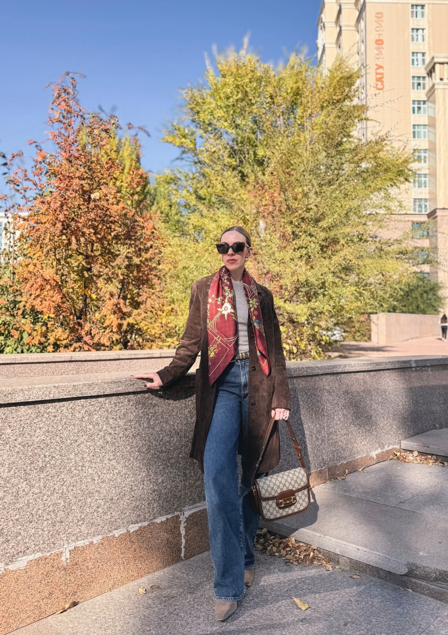 Zara espresso brown suede coat, Gucci burgundy silk scarf, AGOLDE wide leg jeans, Zara suede boots, Gucci bag, fall outfit with suede jacket 

#LTKSeasonal #LTKOver40 #LTKShoeCrush