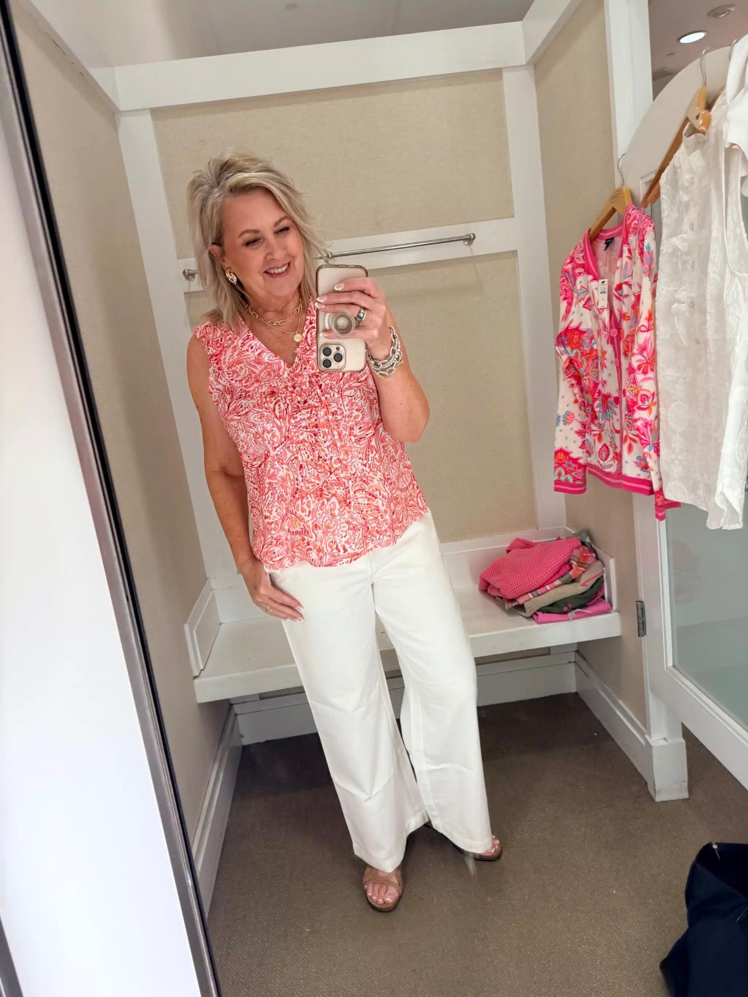 These white jeans will go with just about anything! This ruffled tank was perfect on its own, but you could add another layer over it. My top comes in this color and tan, I’m wearing a size medium. My jeans are size 8. 

#LTKOver40 #LTKootd #LTKWorkwear