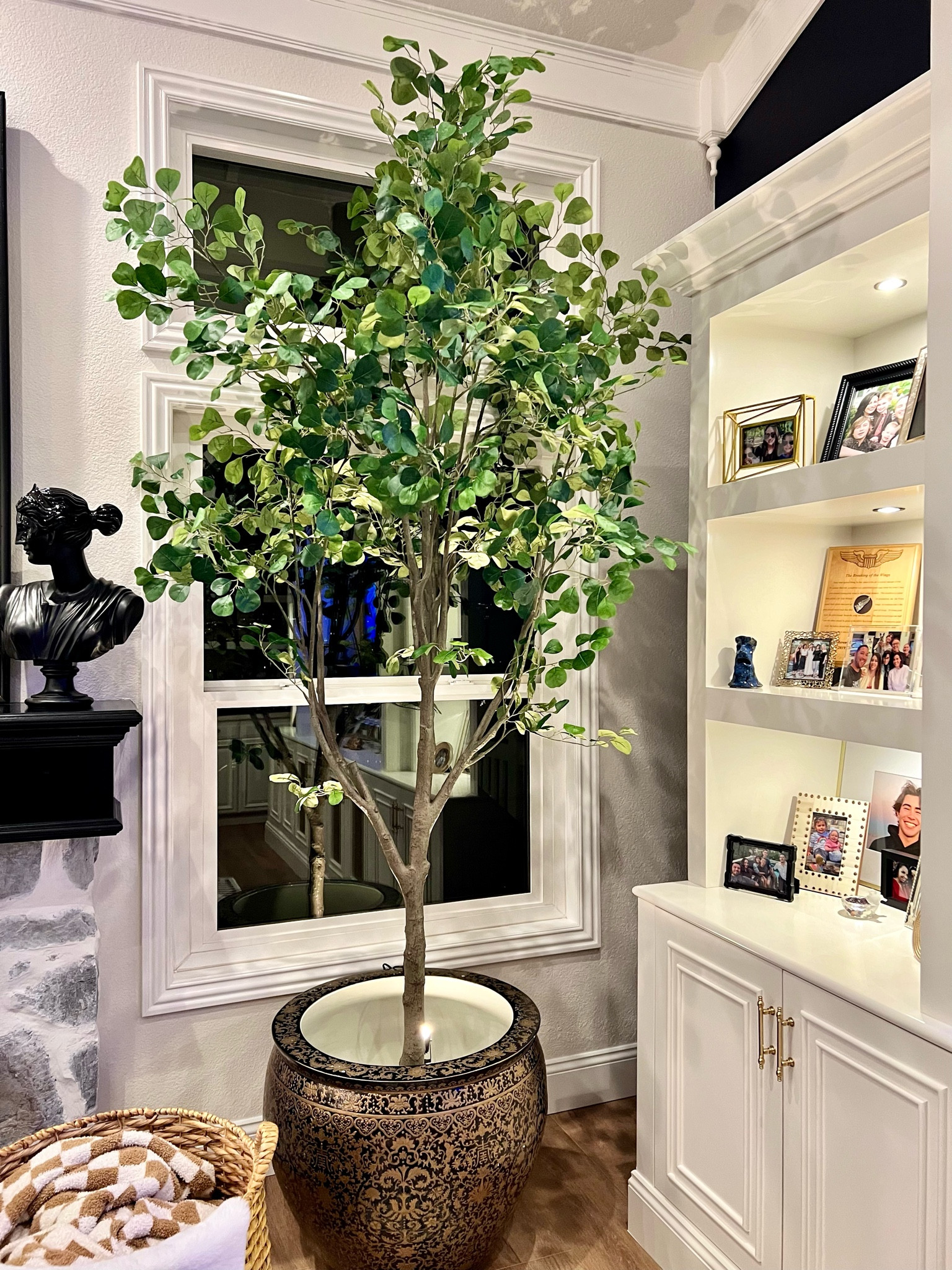 This 9ft faux tree is a STUNNER! So realistic and I can’t kill it!!! 😜Still need to add moss to the top  

#LTKhome #LTKstyletip #LTKfamily