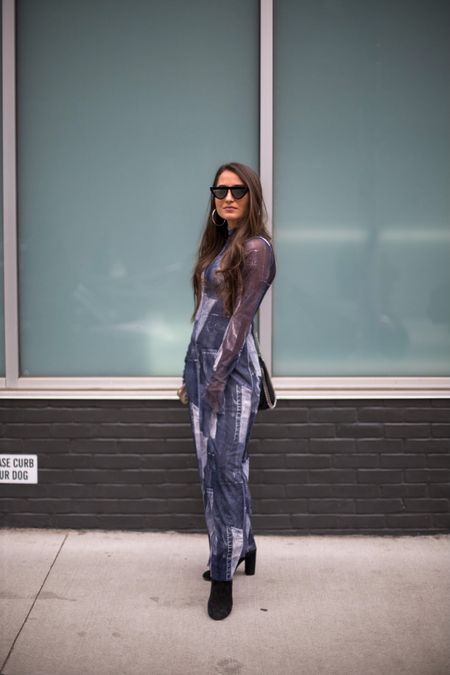 Denim patchwork trend as NYFW street style. Styled with some designer sunnies and versatile day to night bag and boots 