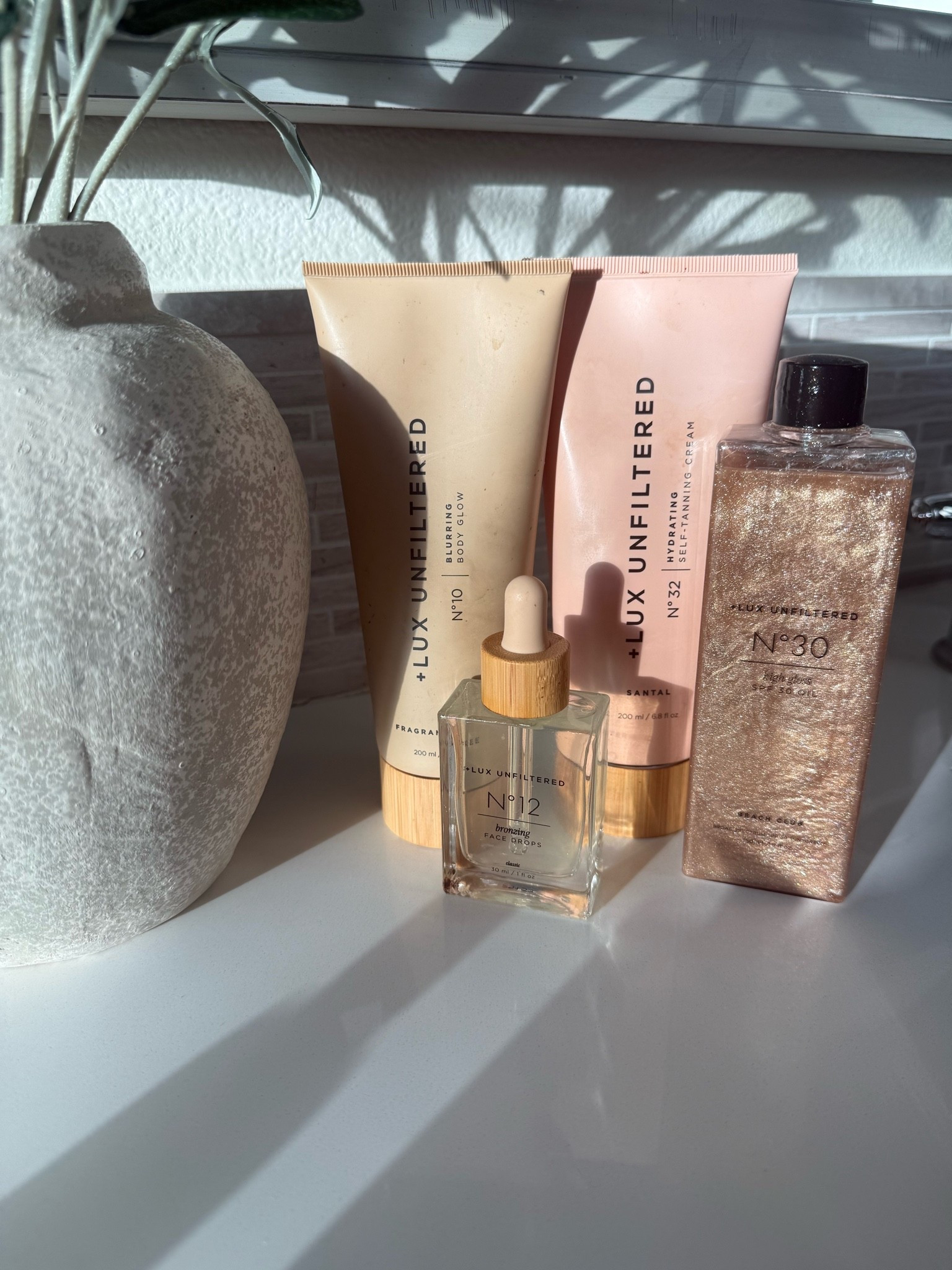 Some of my self tanning faves ☀️ No 32 is a gradual tanning lotion that I use to keep my tan looking even and glowing in between when I apply and exfoliate my weekly tans. No 10 is a beautiful bronzey glow that can be applied for a night out and washes right off. The tanning oil has an spf and has the most beautiful shimmer ✨ The tanning face drops are my go to for a nice subtle glow on my face. I use them every 3ish days. 

Lux Unfiltered, tanning, self tanning, gradual tanning lotion, vacation, spf tanning oil, face tanning drops

#LTKselfcare #LTKBeauty #LTKgrwm