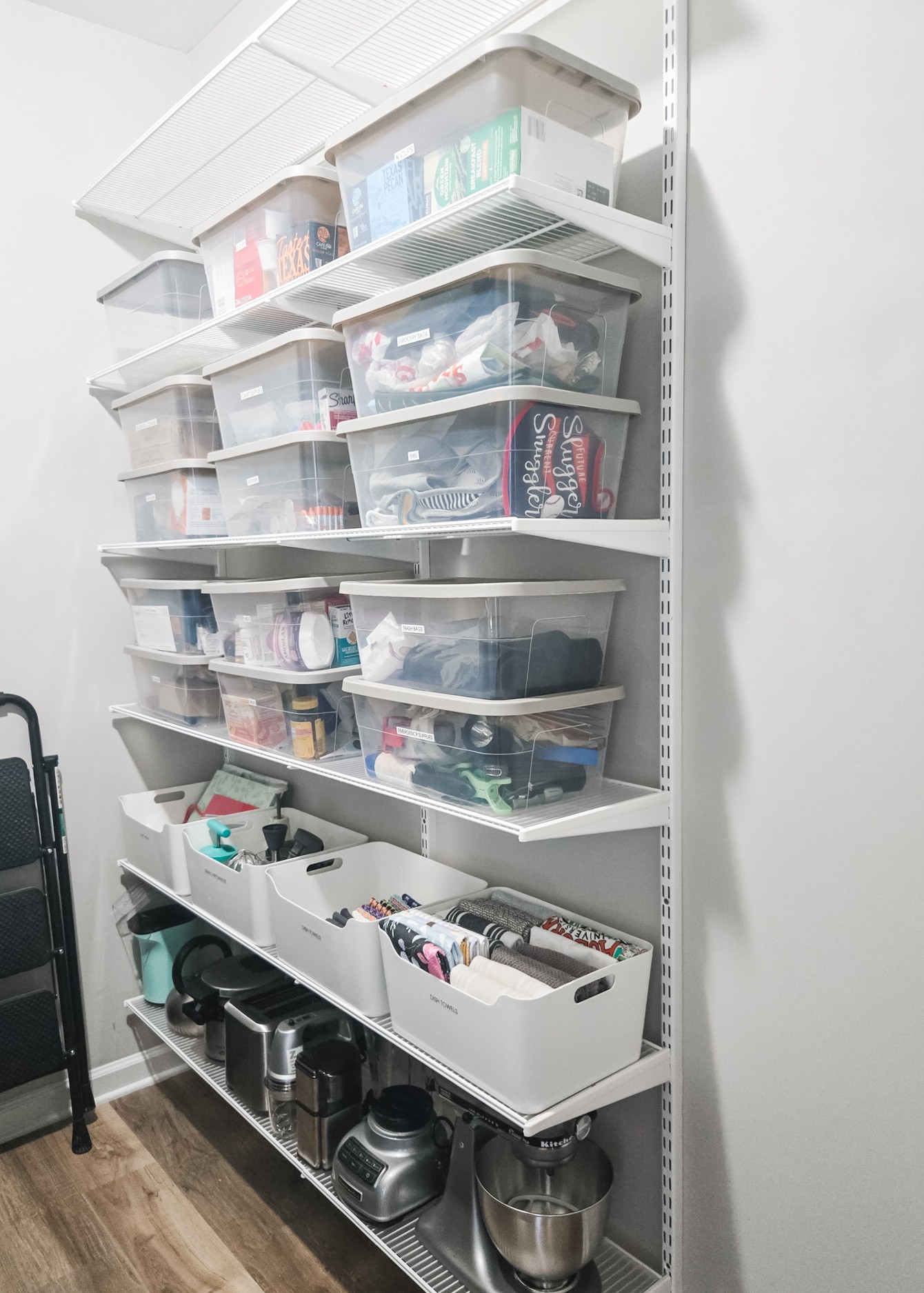 The best way to easily create storage in a smaller room that lacks it (like this laundry room) is to add Elfa wall shelves. Our team measures and orders, our team support crew picks up, our installers install them, and our organizers work their magic with labeled bins to make your room a fresh space. 😏 

Like the saying goes, teamwork makes the dream work! Being able to create this much storage for our sweet client was the icing on the cake.

Do you need some more storage? We'd love to help you out. 

 