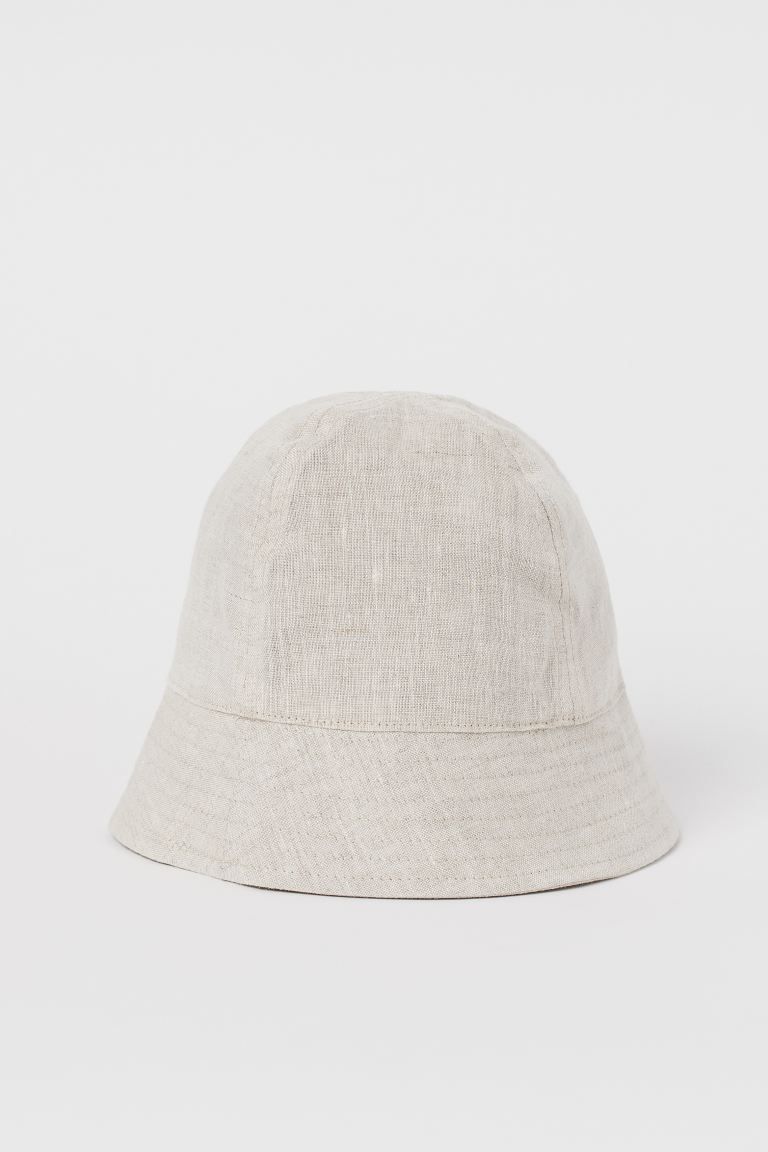 Baby Exclusive. Sun hat in soft linen. Lined in woven cotton fabric. Width of brim 2 in. | H&M (US + CA)