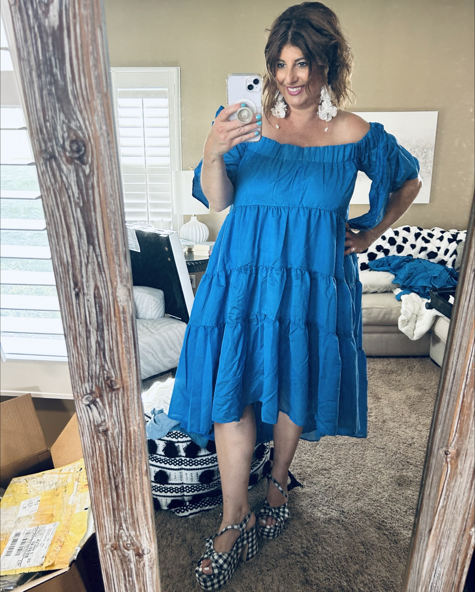 Wore this gorgeous Anthropologie dress for my daughter’s graduation party! My absolute favorite dress! Very flattering!
Wearing size xl for reference. The sleeves are a bit snug so I wasn’t able to size down for that reason. Gingham platform shoes are from Anthro last year. They are brand-Seychelles Gingham platform  #offtheshoulderdress gingham print heels 
Flower dangle earrings

#LTKStyleTip #LTKMidsize #LTKFamily