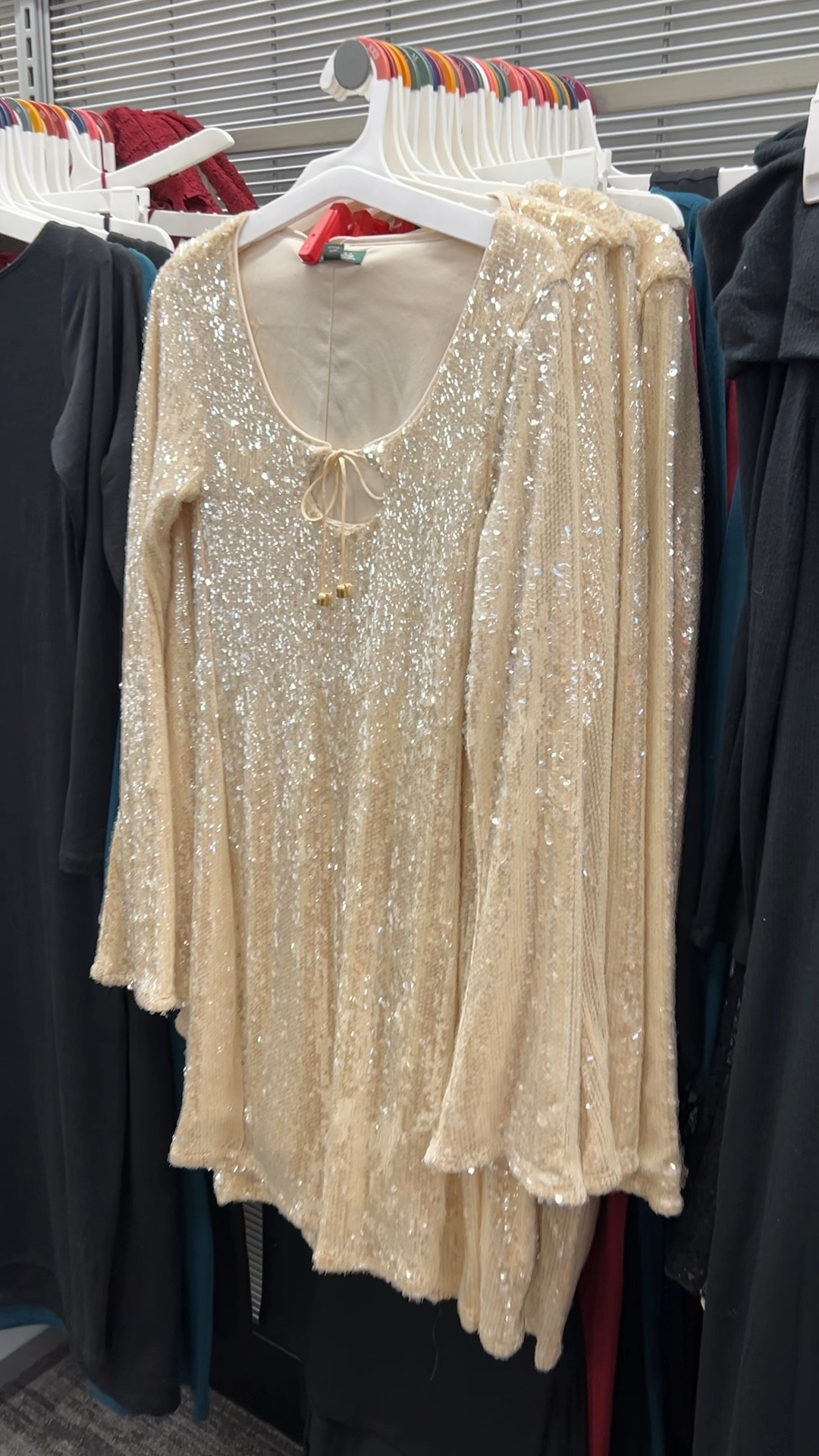 Long sleeve sequin mini shift dress / champagne sequin mini dress / holiday party dress / nye dress / affordable holiday dress 
Size: XS 

#LTKFindsUnder50 #LTKParties #LTKHoliday