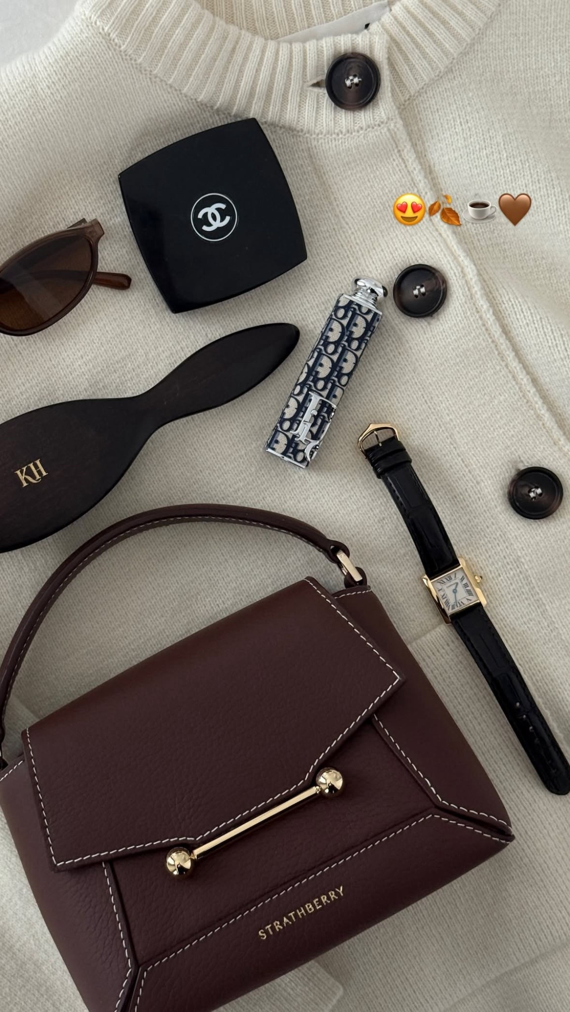What’s in my bag🤎 Amazon sunnies, Officine Universelle Buly Hairbrush, Dior lipstick, Chanel brown powder and my Cartier watch. Everything what I need in my Strathberry bag 

#LTKbag #LTKFashionMonth #LTKautumn