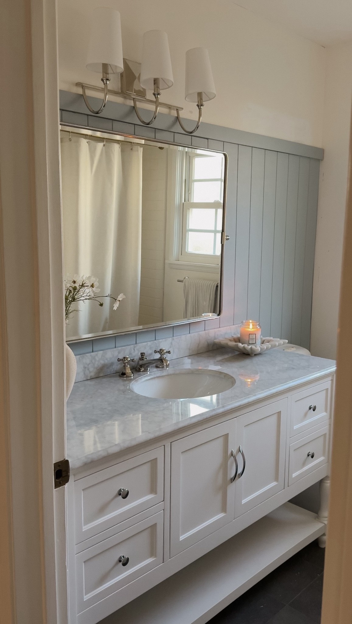 #ad bathroom remodel with @wayfair! Easy swaps that can transform a space: vanity, mirrors, lighting, and a little bit of shiplpap & paint! #wayfair #wayfairpartner