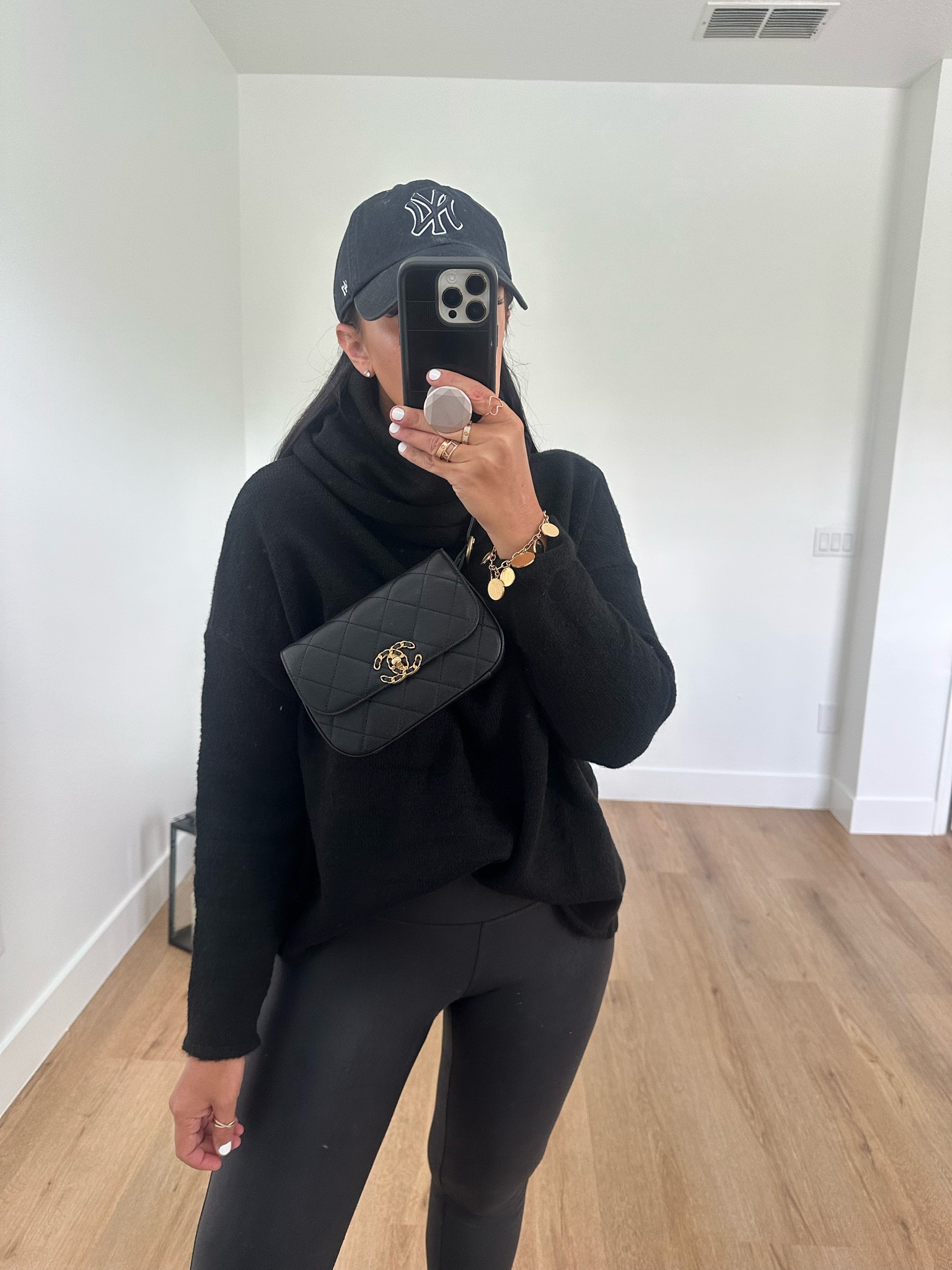 Time and Tru Women’s Mid Shaft Chelsea Boots wearing size 9. Time and Tru Women's Faux Leather Leggings wearing size small. Dreamers by Debut Womens Cowl Neck Pullover Long Sleeve Sweater wearing size medium. 
