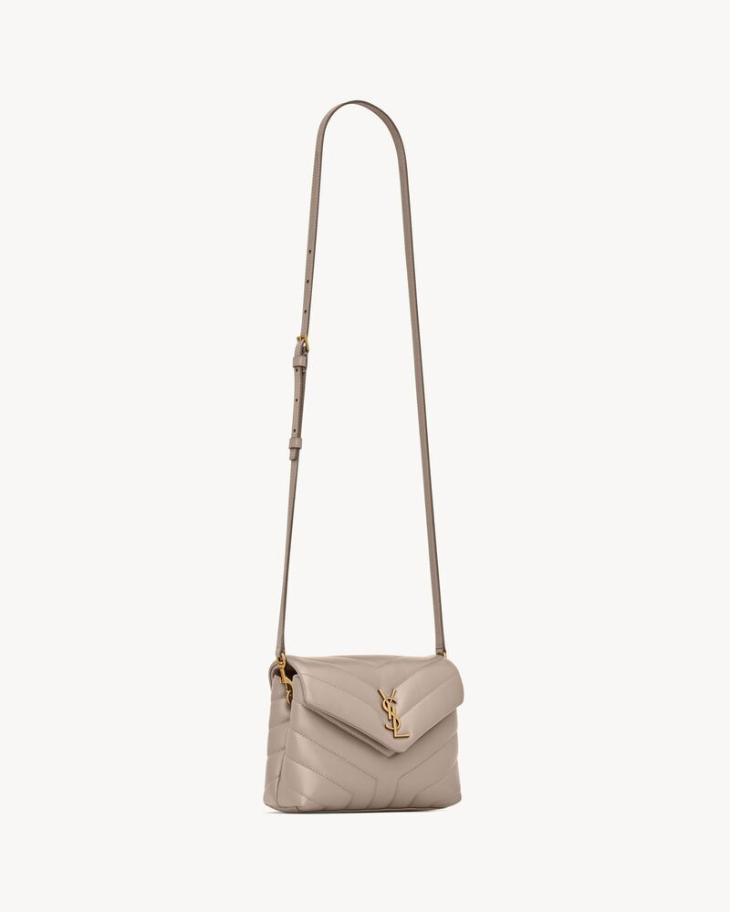 SAINT LAURENT BAG WITH FRONT FLAP DECORATED WITH ICONIC YSL SIGNATURE, Y-QUILTED OVERSTITCHING AN... | Saint Laurent Inc. (Global)