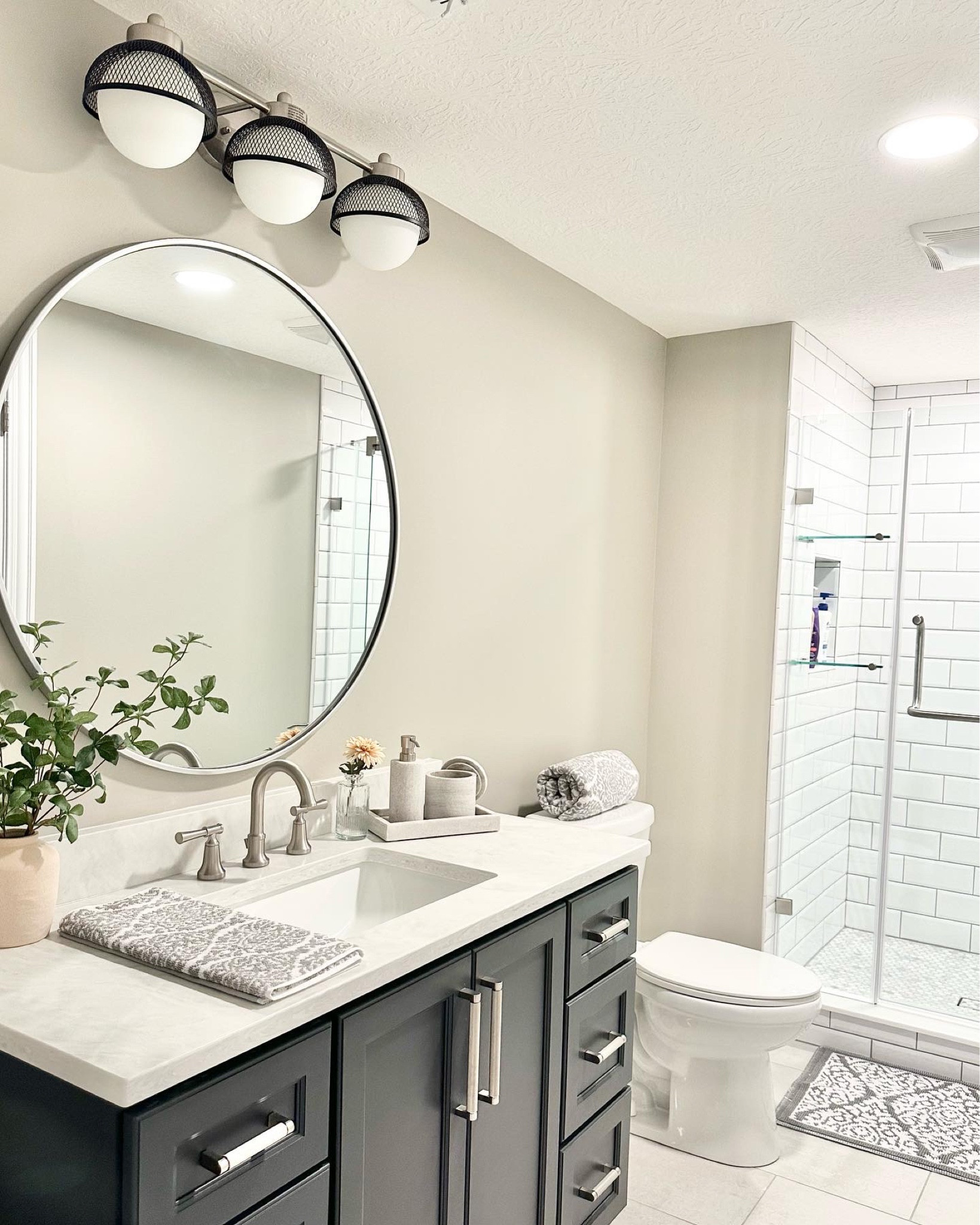 From an unfinished concrete space to a luxury basement bathroom, this is giving all the spa vibes! We created this gorgeous bathroom space to compliment a newly finished basement that includes a huge bar, entertainment room, bedroom, and gym. I can’t get over the vanity light 🙌🏼

#LTKhome #LTKFind #LTKstyletip