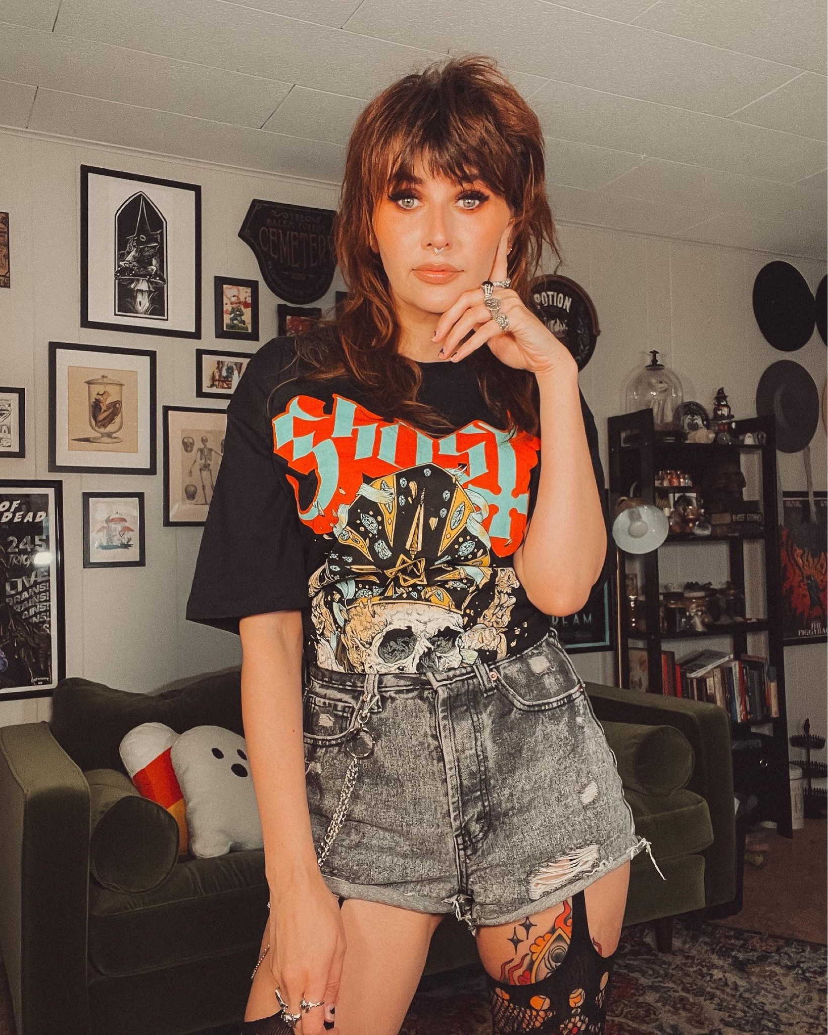Wearing a Ghost the band shirt for this 80s aesthetic, grunge goth, alternative fashion look. Distressed denim shorts with a wallet chain and band tee.

#LTKstyletip #LTKunder50 #LTKGiftGuide