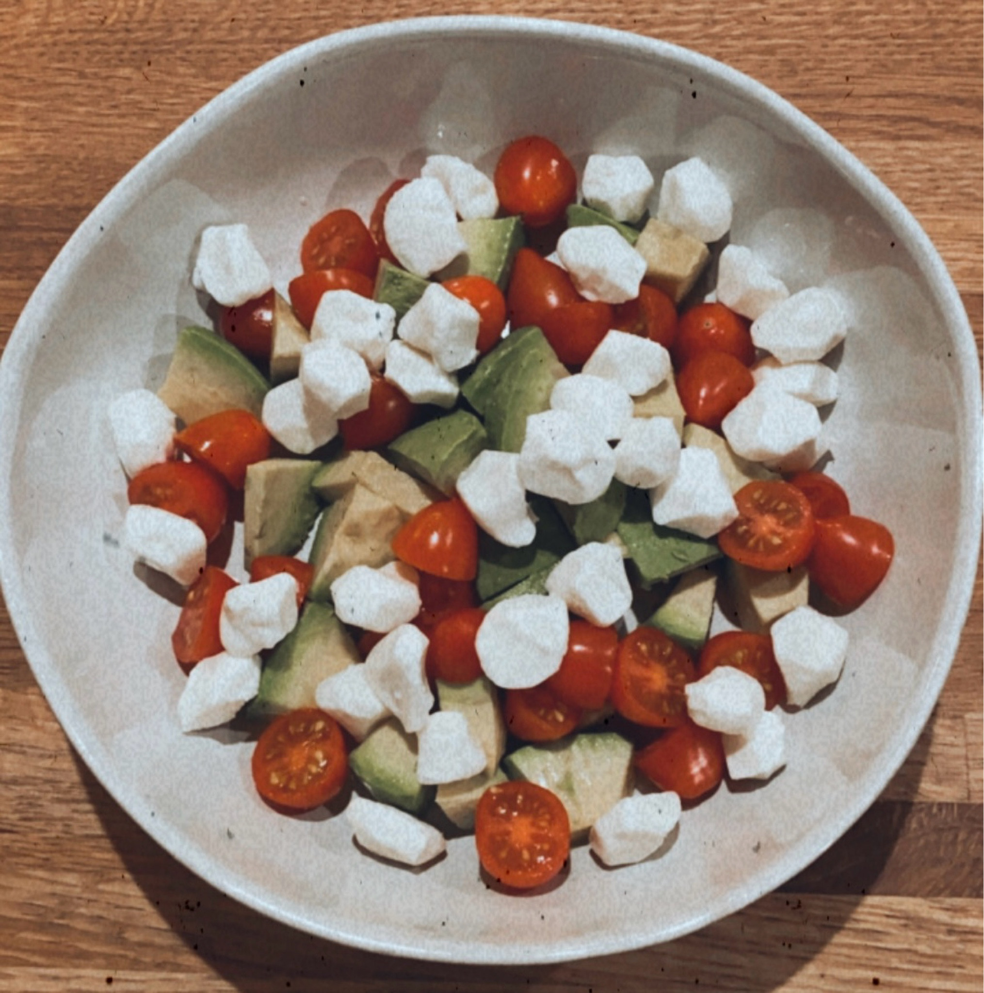 Quigley’s Caprese:
Equal parts 
-Cherry Tomatoes (cut in half)
-Mozzarella pearls (cut in half)
-Avocado 

Top with fresh basil, a squeeze of lime, Nonna Pias Balsamic (linked), and Everything but the Bagel seasoning (also linked!)

Enjoy and share with friends :)
