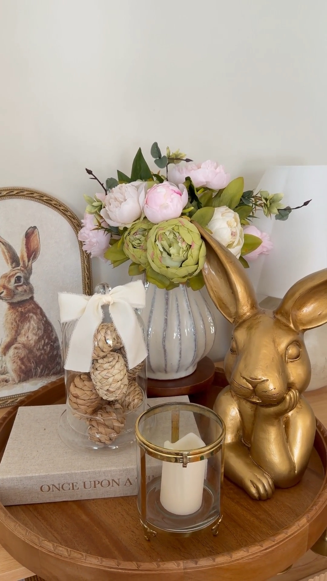 I’m loving @Michaels Easter decor so far and I put together this centerpiece for my buffet with this bunny portrait and my fave gold bunny! 

#LTKHome #LTKSeasonal