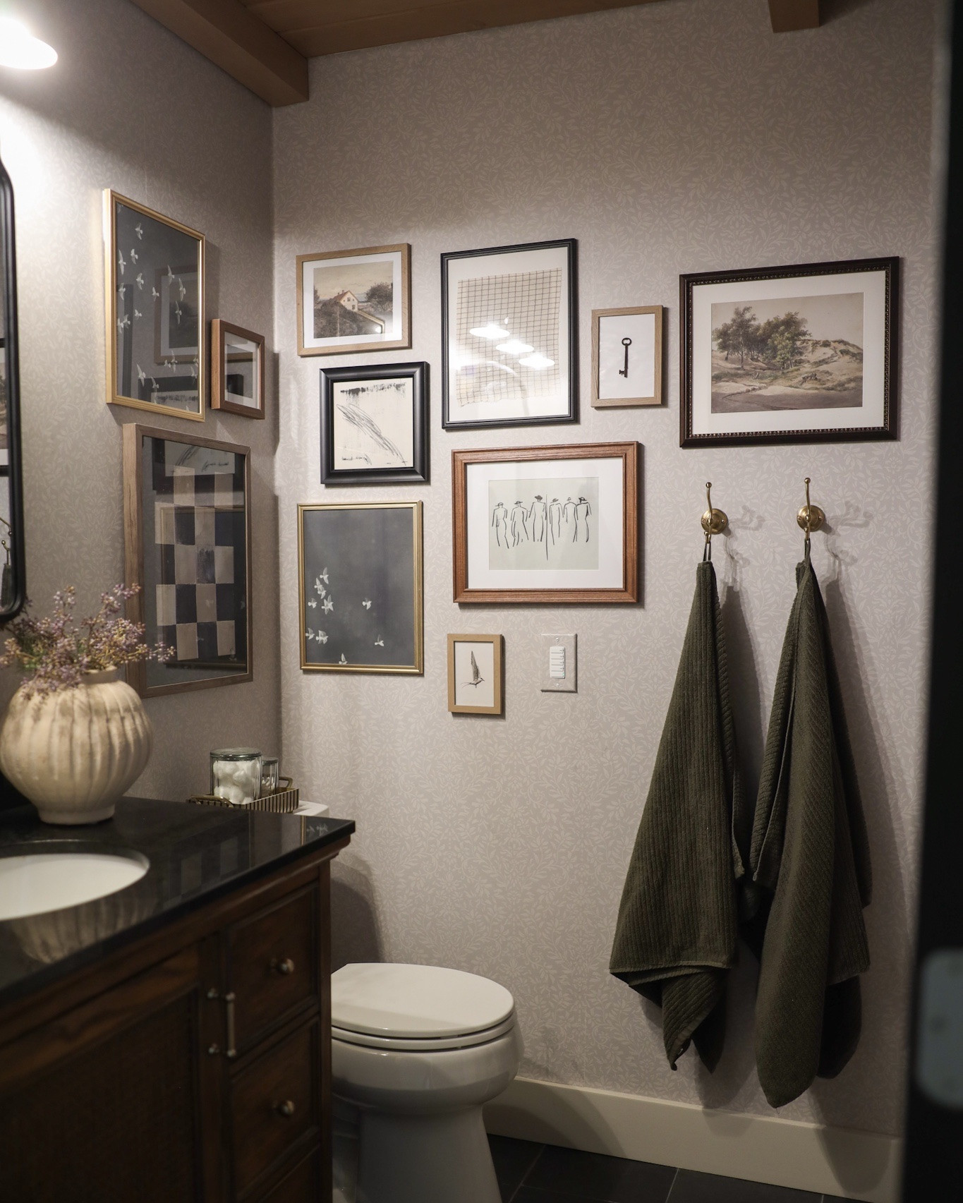 Instead of decorating with a cabinet or a shelf, try a gallery wall. Fills the space and then you don’t have to display your TP 🫢

#LTKHome