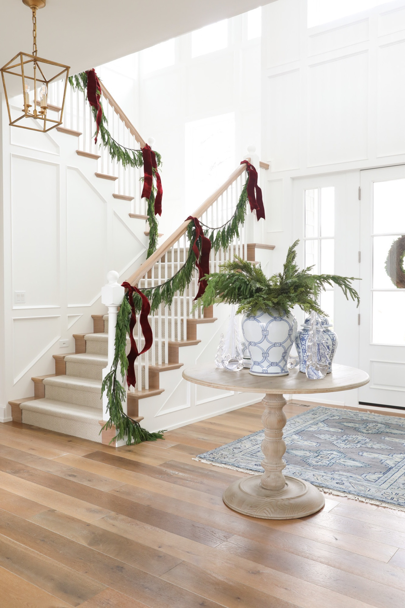 Staircase, entry, foyer, entryway, entryway table, entry table, garland, faux garland, velvet ribbon, christmas, Christmas decor 

#LTKSeasonal #LTKhome #LTKHoliday