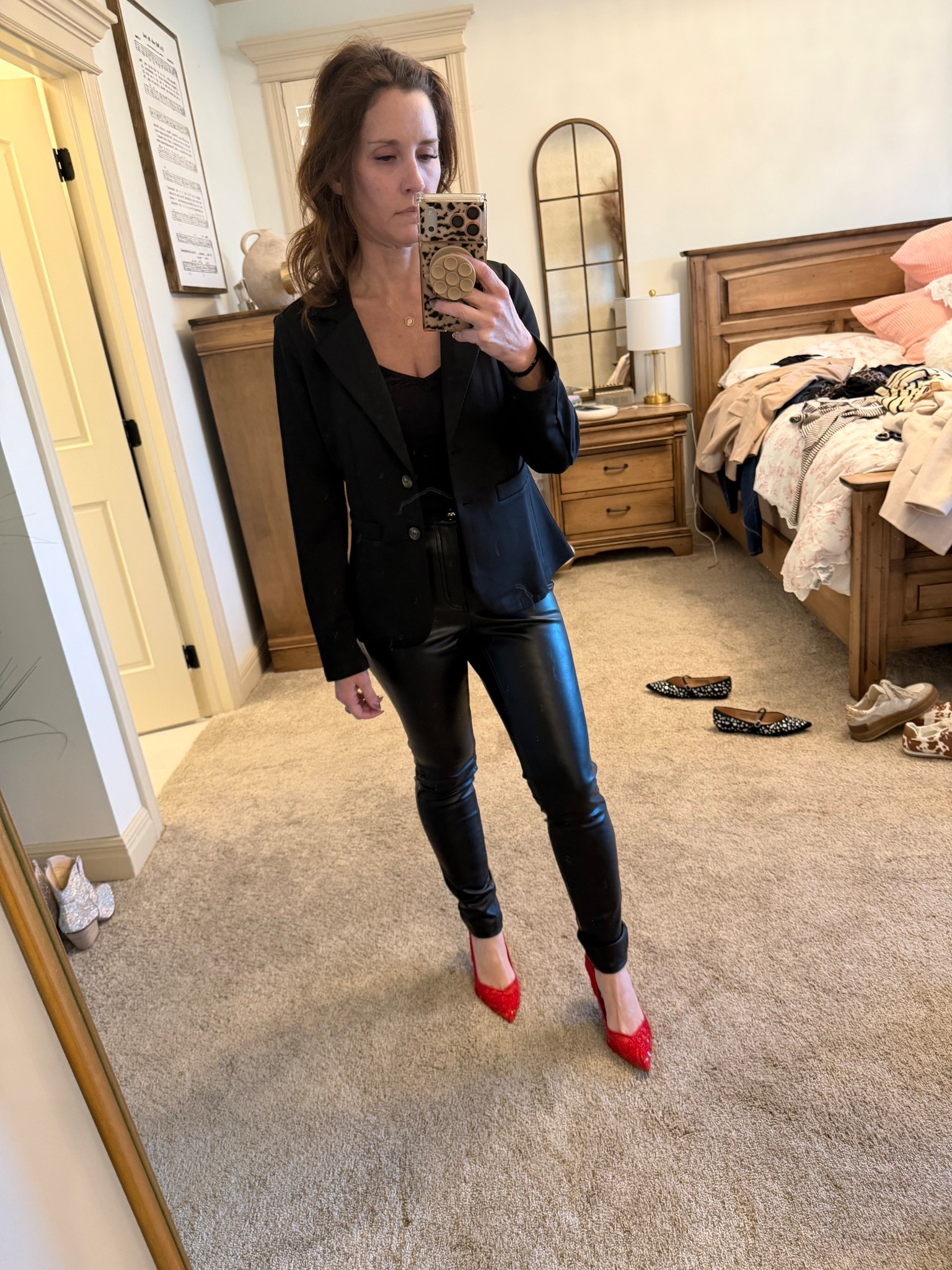 Business casual all black with a pop of red 

#LTKootd #LTKWorkwear #LTKOver40