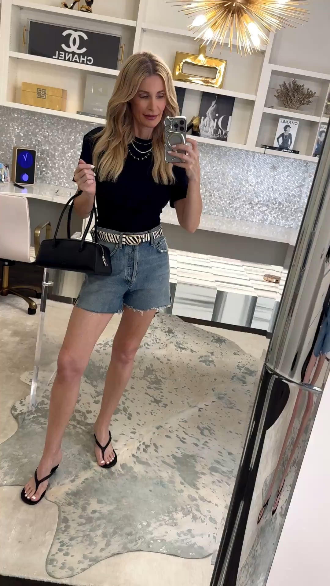 The ONE fall accessory that instantly elevates any outfit! This $64 zebra calf-hair belt adds a chic statement to longer AGOLDE denim shorts and a fitted black tee—even the simplest look feels polished with almost no effort. I’m wearing an XS in the top and belt and a size 24 in the shorts.

#LTKdayinmylife #LTKOver40 #LTKSaleAlert