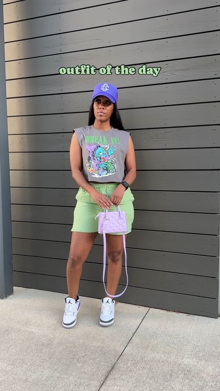 Summer street style outfits I’m wearing a cropped graphic tee with lime green shorts. I styled it with a purple trucker hat, purple mini crossbody bag, and my Jordan 3 dark iris

#LTKFestival #LTKstyletip #LTKSeasonal