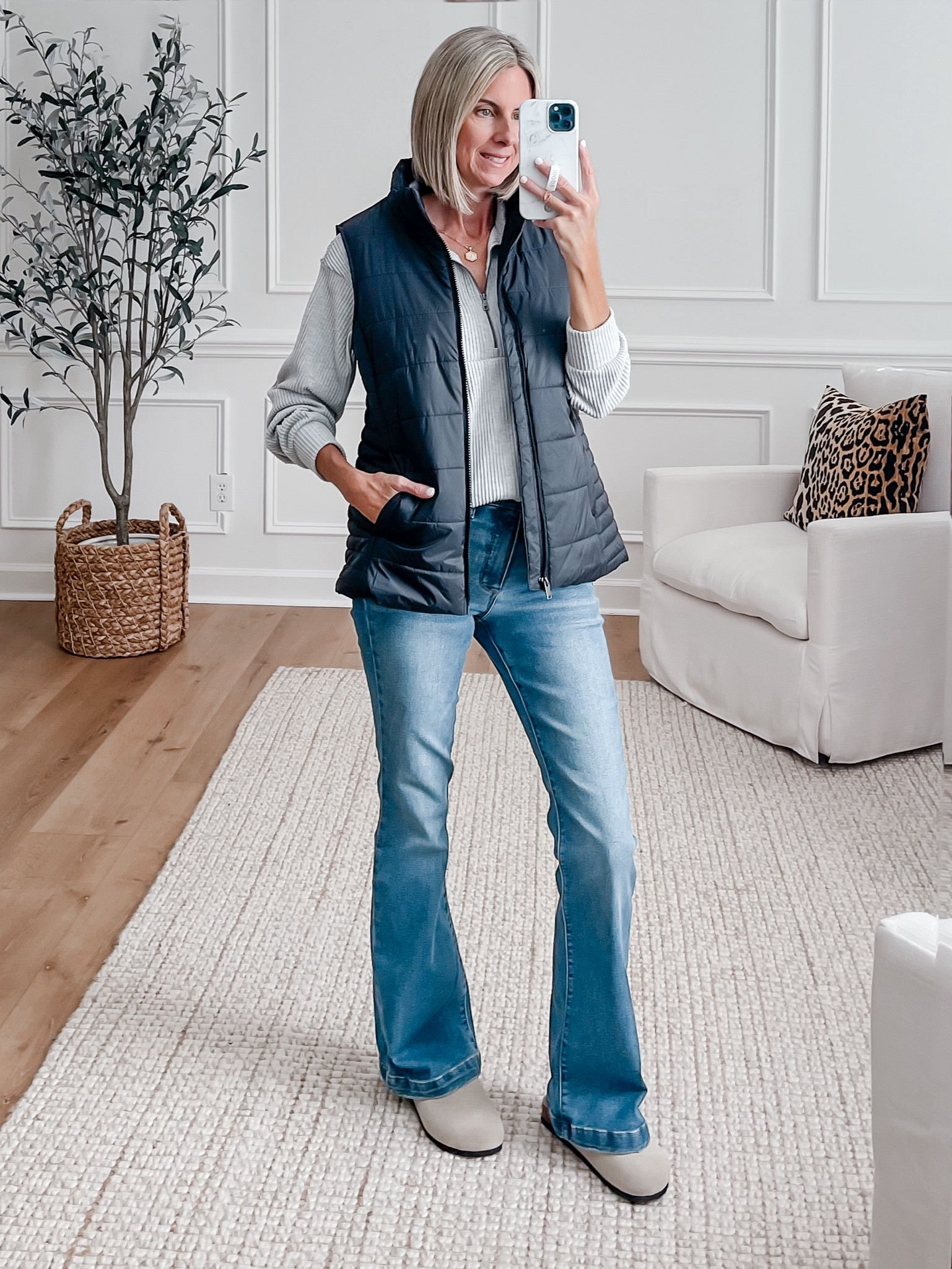 Here it is with a puffer vest for those cooler days. Another great pullover from Walmart! Love the shorter length of this one. It has a big collar, half zip and pockets. Perfect for throwing on to run errands or to my kid’s sporting events. In a small. These jeans are so good! Walmart for the win this season for sure! In a size 4.  

#LTKSaleAlert #LTKFindsUnder50 #LTKOver40