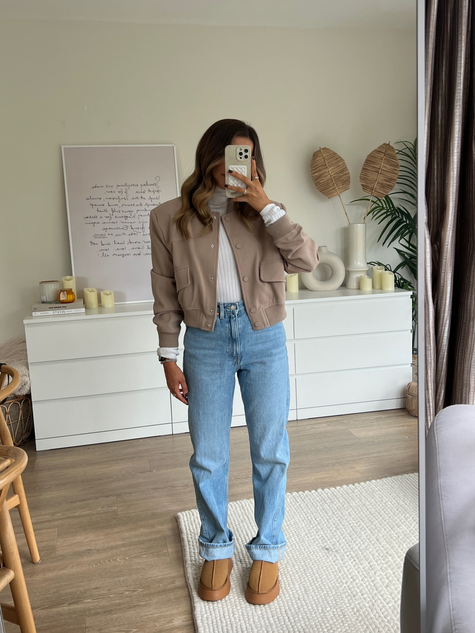 Beige cropped bomber jacket from river island styled with blue straight leg jeans and ugg Tasman slipper dupes 

#LTKeurope #LTKstyletip #LTKfindsunder100