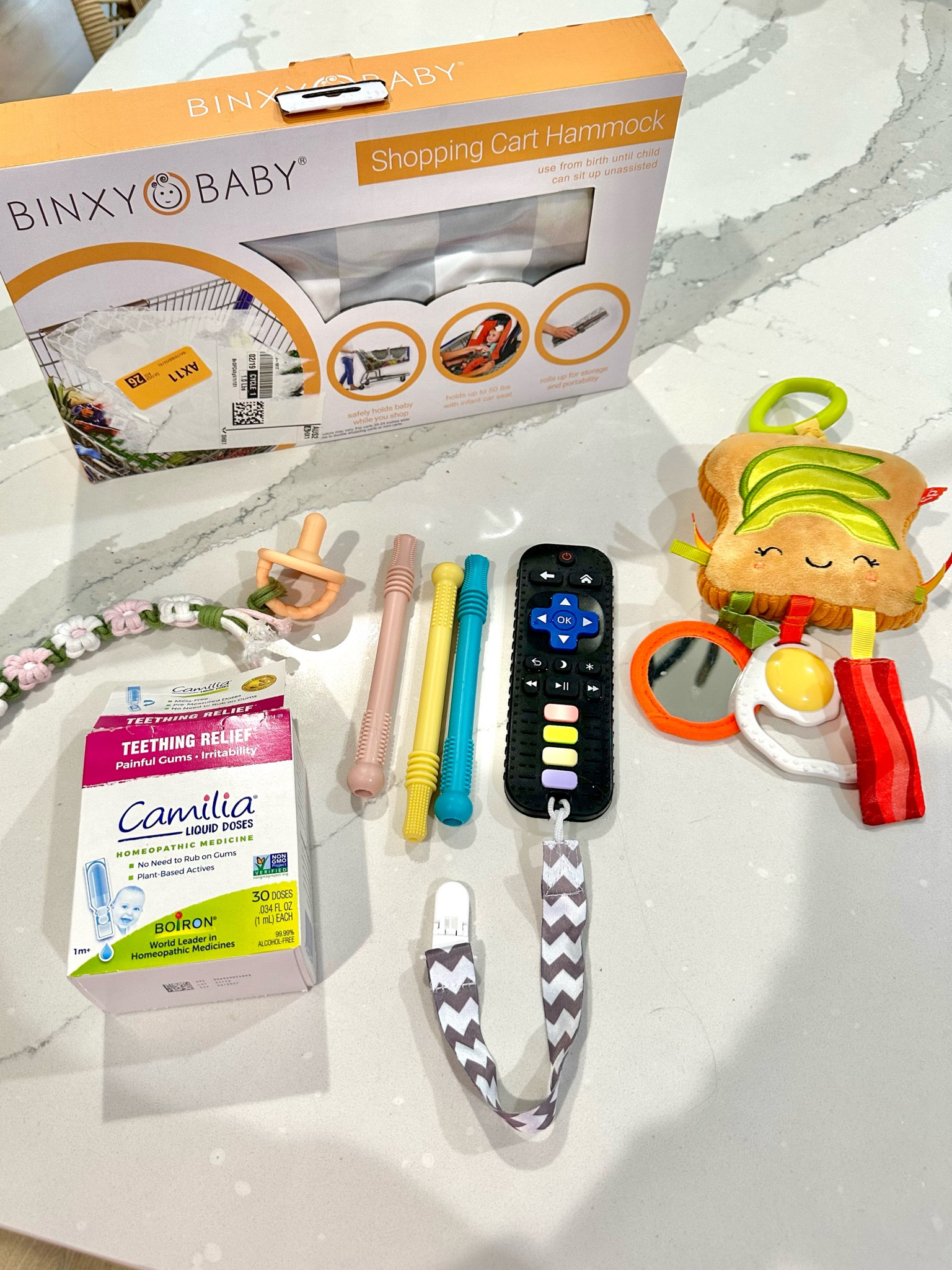 Amazon baby finds! Baby shopping cart hammock. Baby teethers. Pacifier clip. Paci 

#LTKBaby