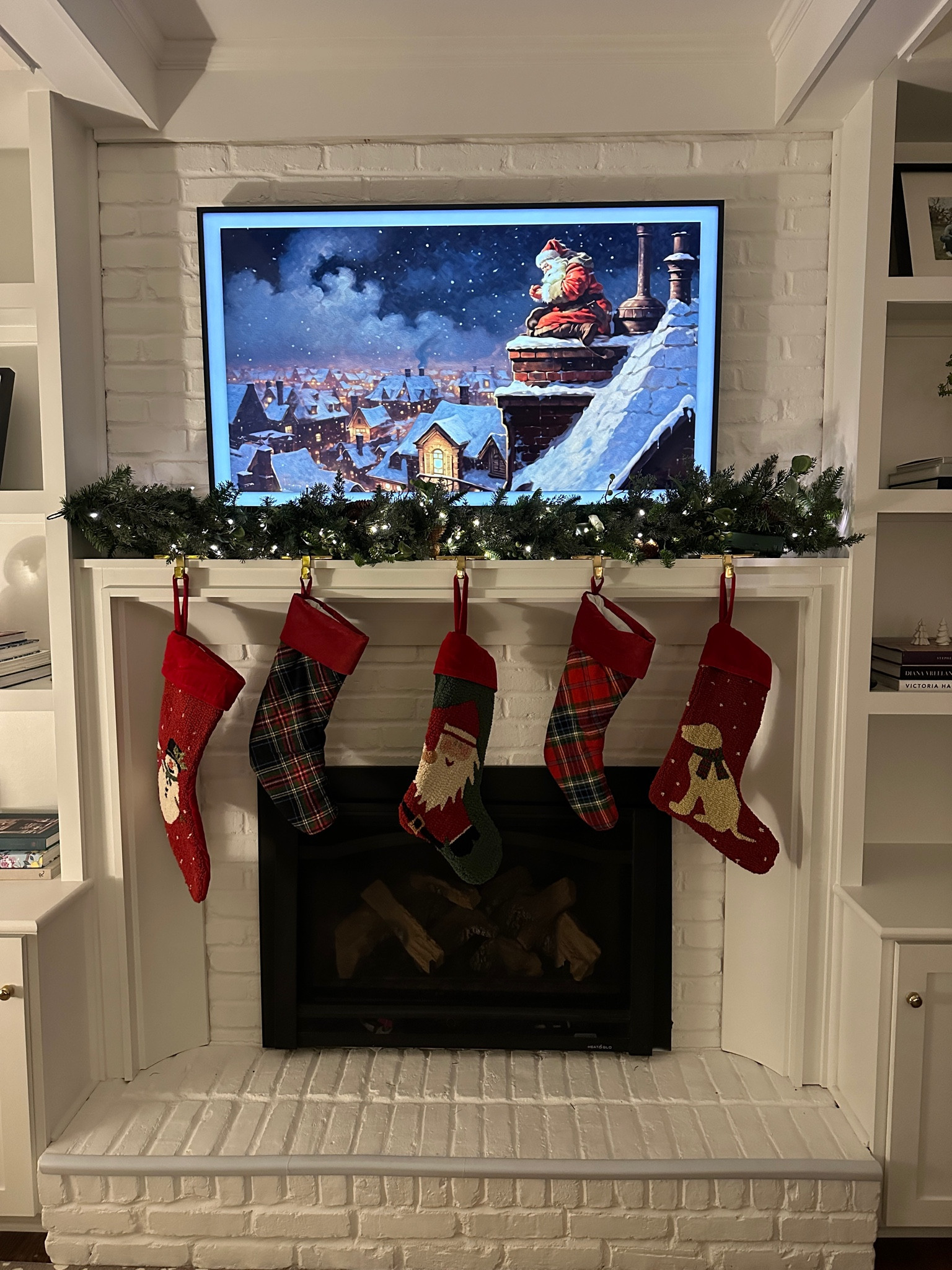 Christmas stockings, holiday stockings, Christmas garland, frame TV, Christmas decorations

#LTKHoliday #LTKHome #LTKSeasonal